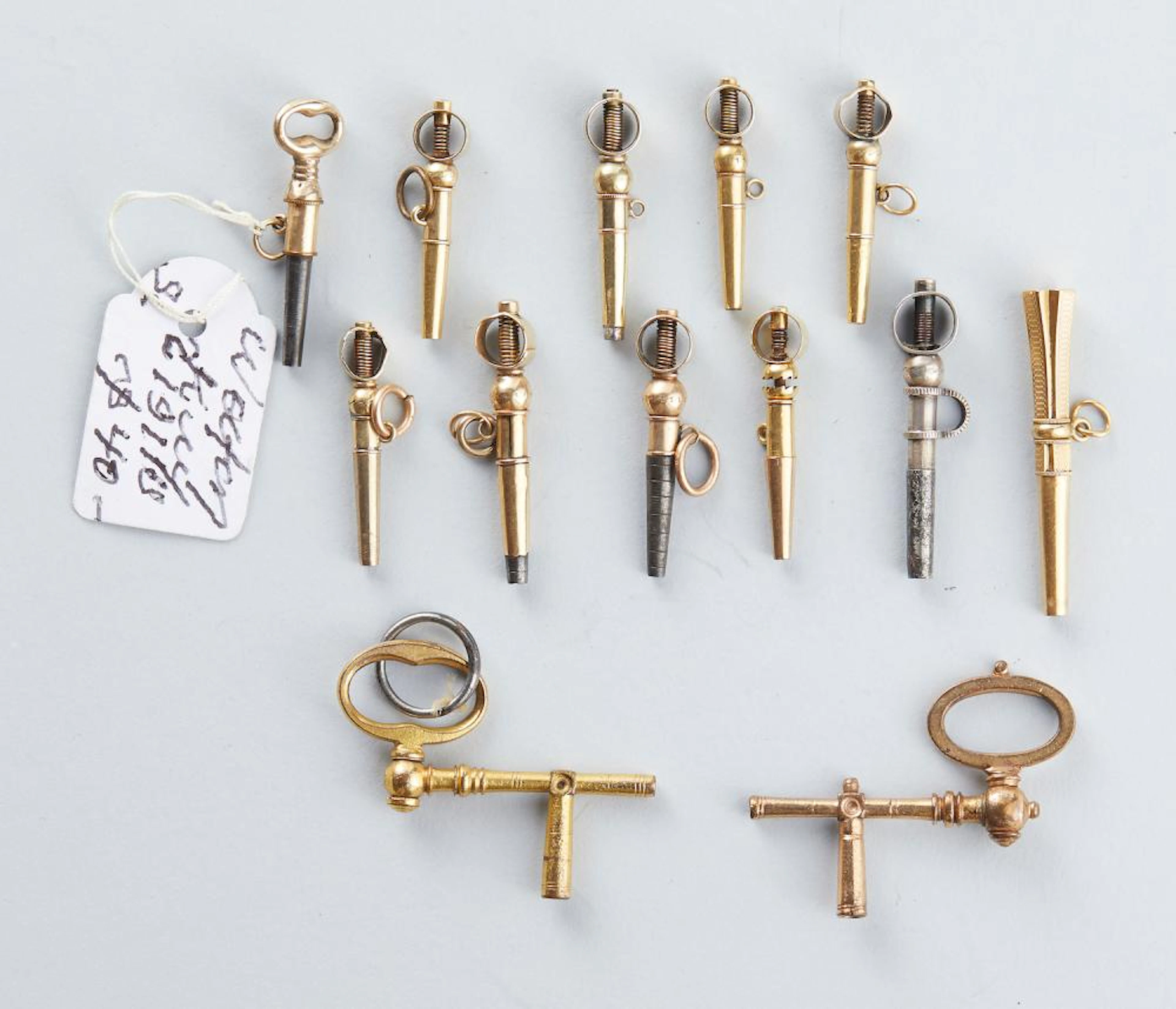A COLLECTION OF THIRTEEN EARLY 19TH CENTURY WATCH KEYS