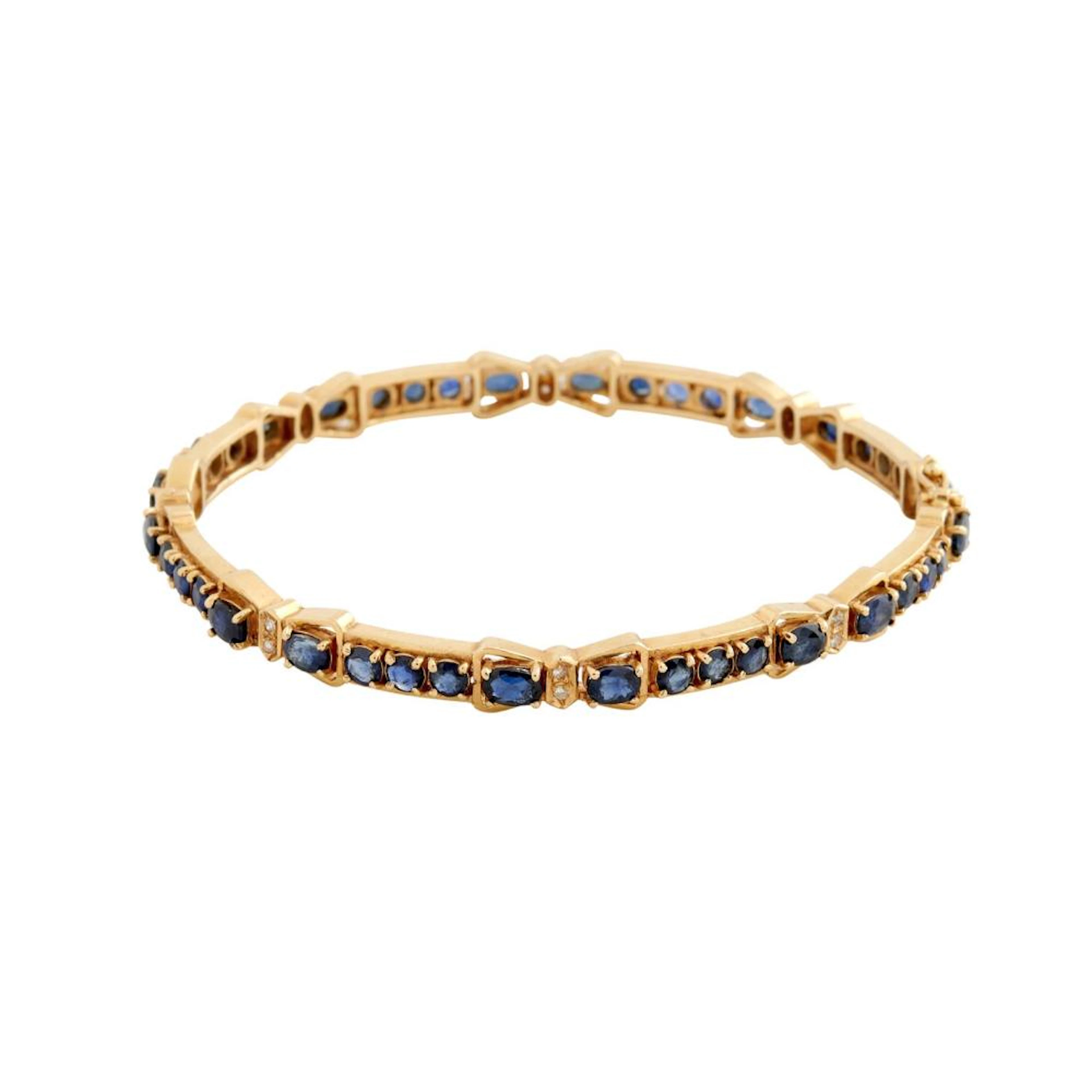 18CT GOLD, SAPPHIRE AND DIAMOND BANGLE
