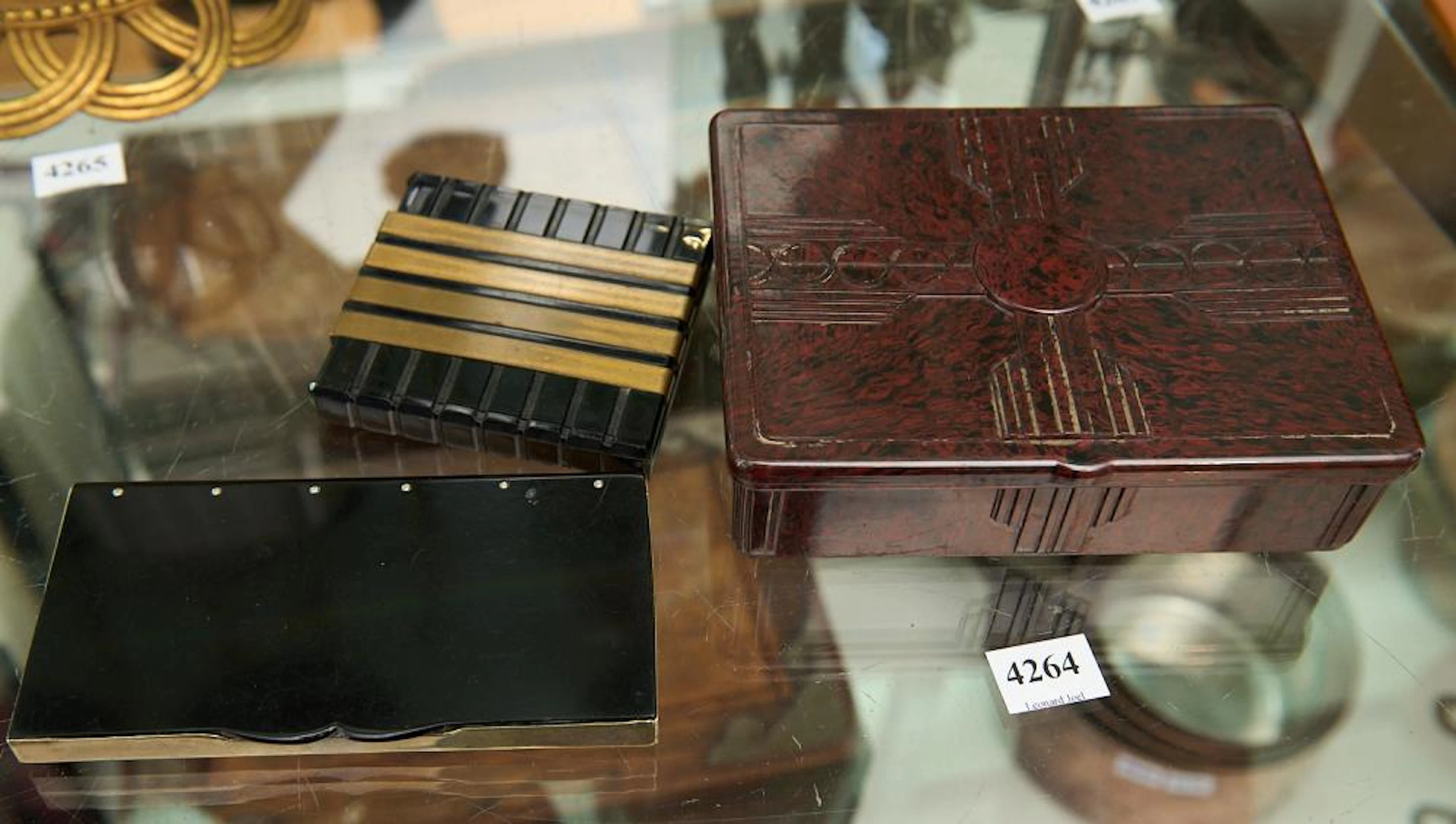 A GROUP OF THREE ART DECO BAKELITE LIDDED BOXES INCLUDING...