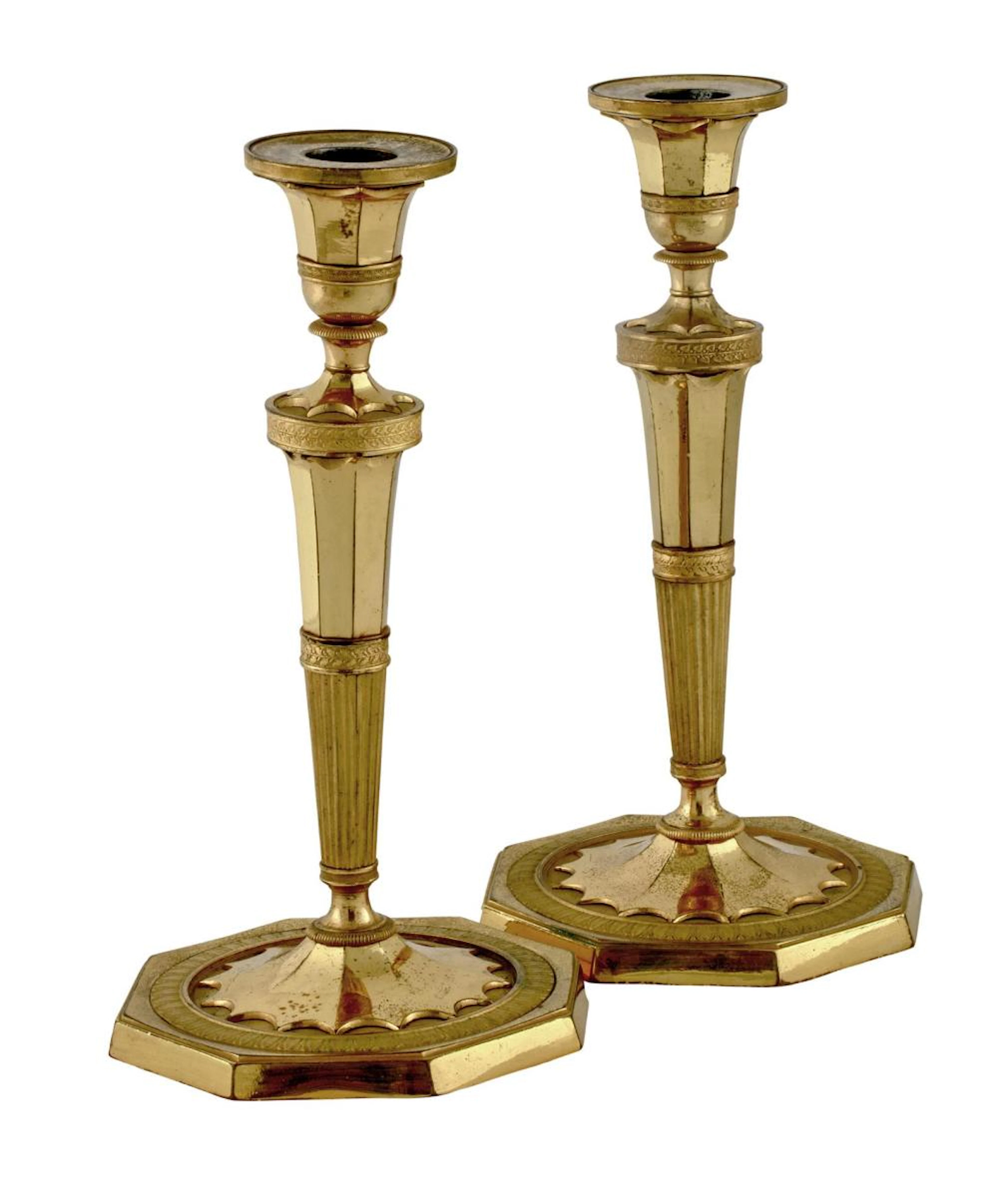 A PAIR OF RUSSIAN ORMOLU CANDLESTICKS