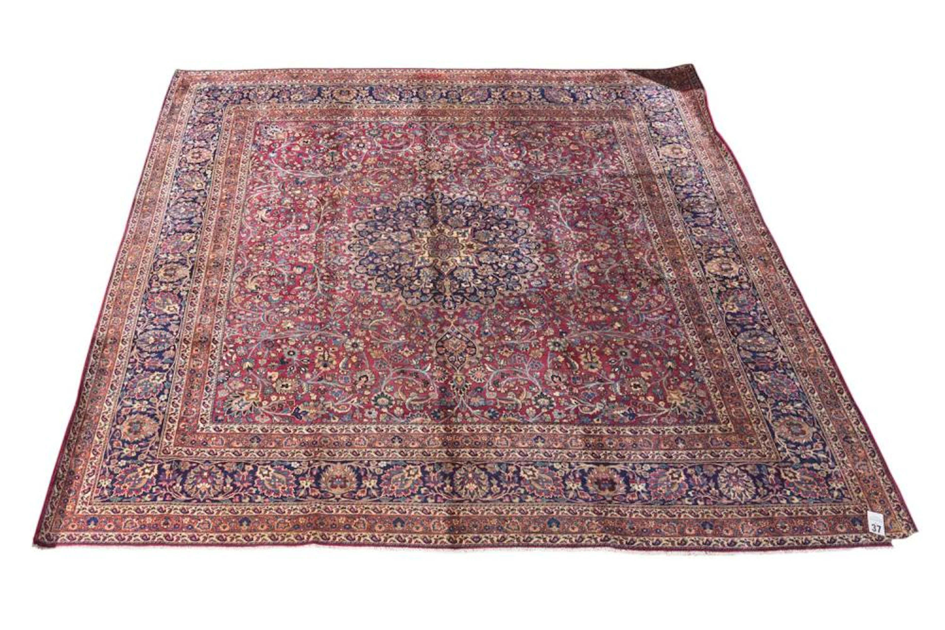 AN ANTIQUE CIRCA 1910s PERSIAN MASHHAD "DOROKHSH" CARPET