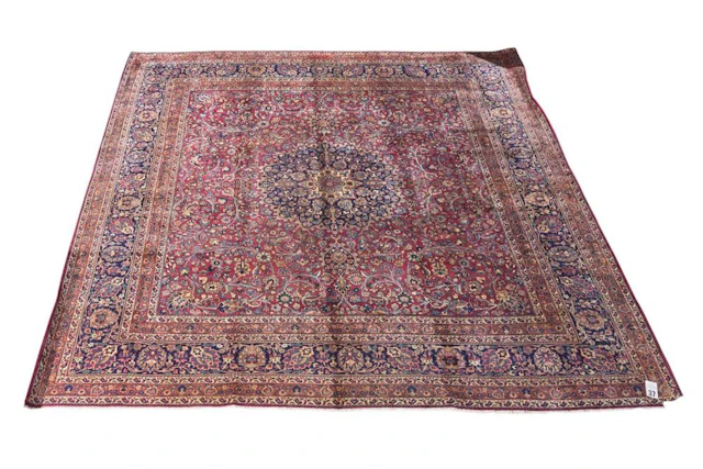 AN ANTIQUE CIRCA 1910s PERSIAN MASHHAD "DOROKHSH" CARPET