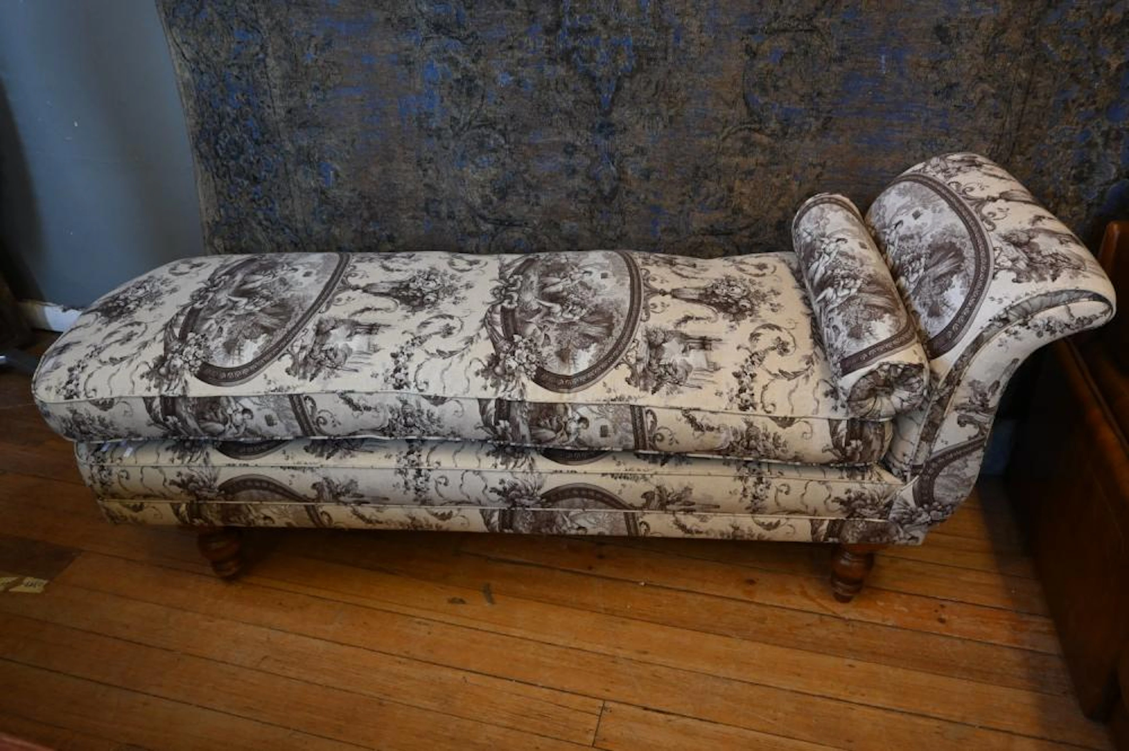 A FRENCH LINEN AND FEATHERDOWN CHAISE LOUNGE (86H X 206W...