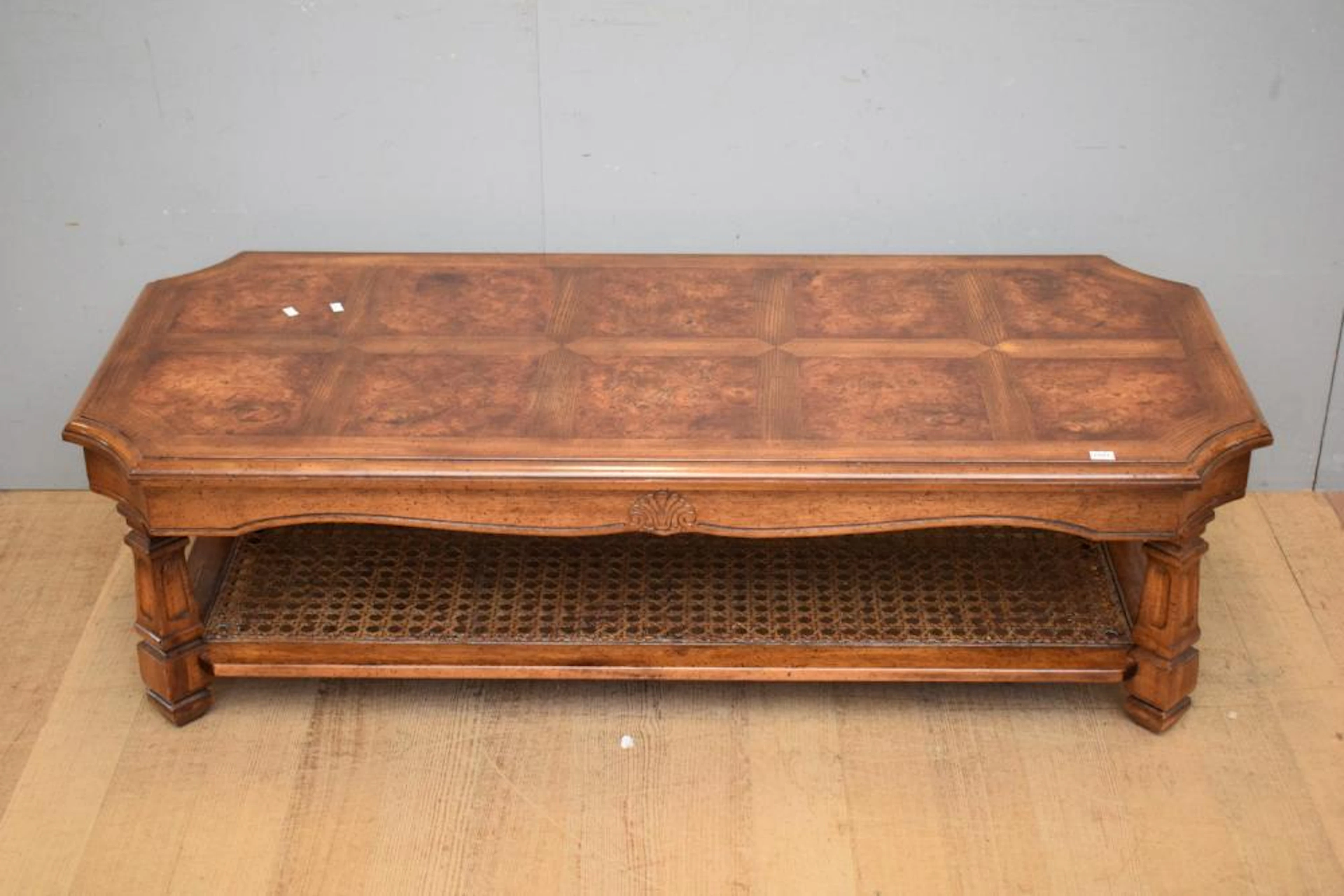 A DECORATIVE WALNUT VENEERED TWO TIER COFFEE TABLE (H42 X...