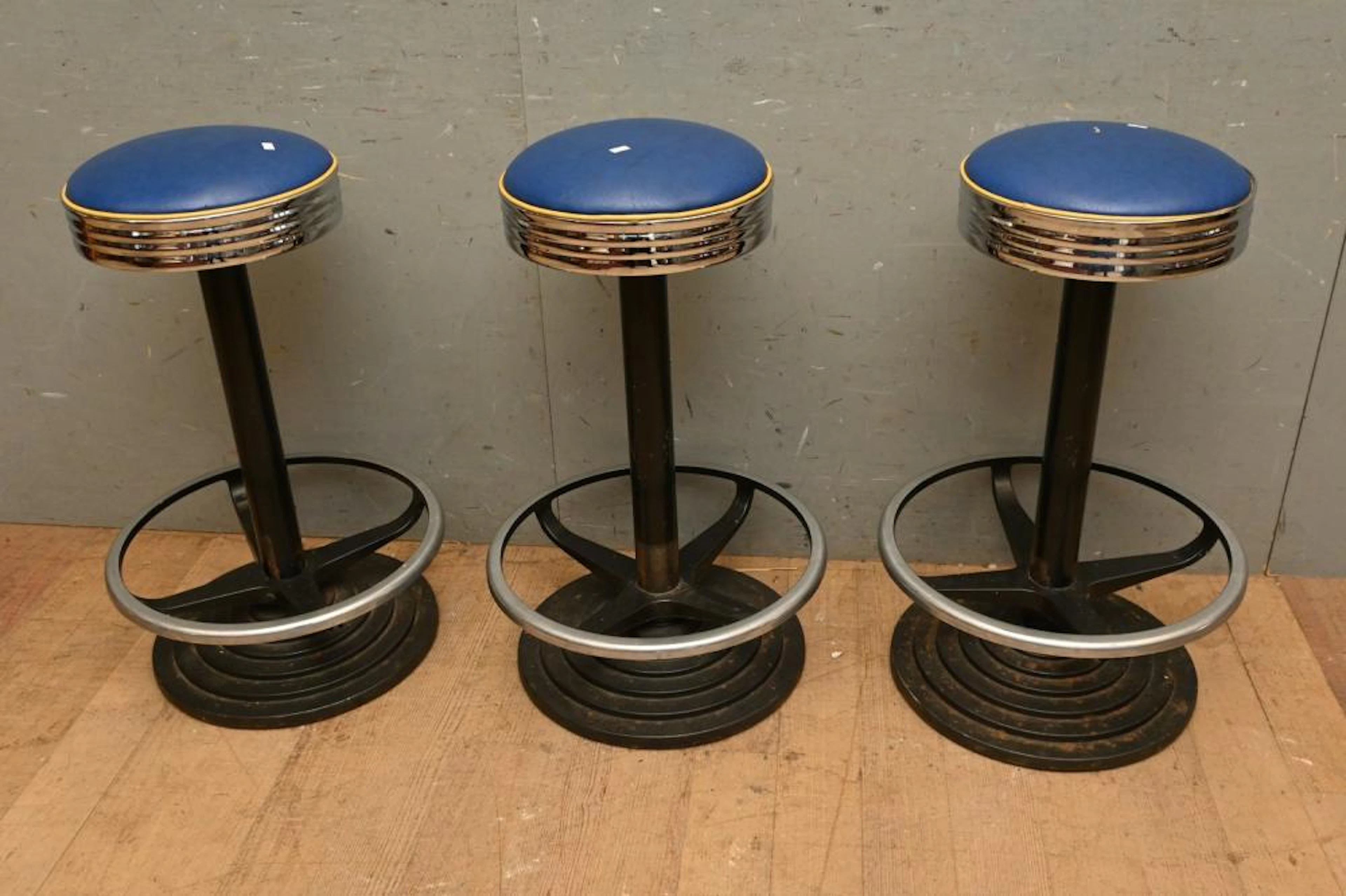 A SET OF THREE AMERICAN DINER STOOLS CIRCA 1960'S (A/F) (...