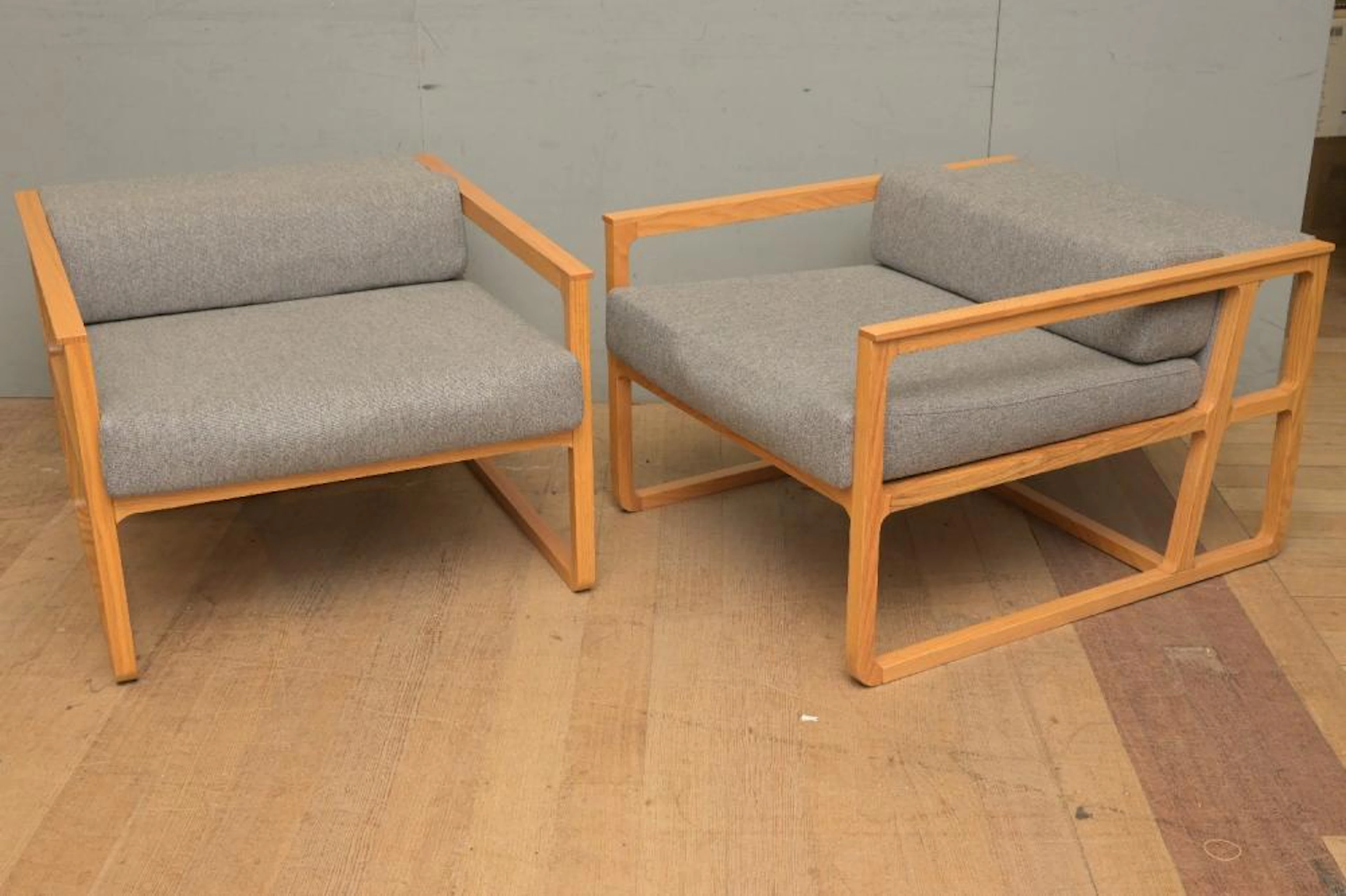 A PAIR OF BAUHAUS INSPIRED OAK ARMCHAIRS PURCHASED FROM...