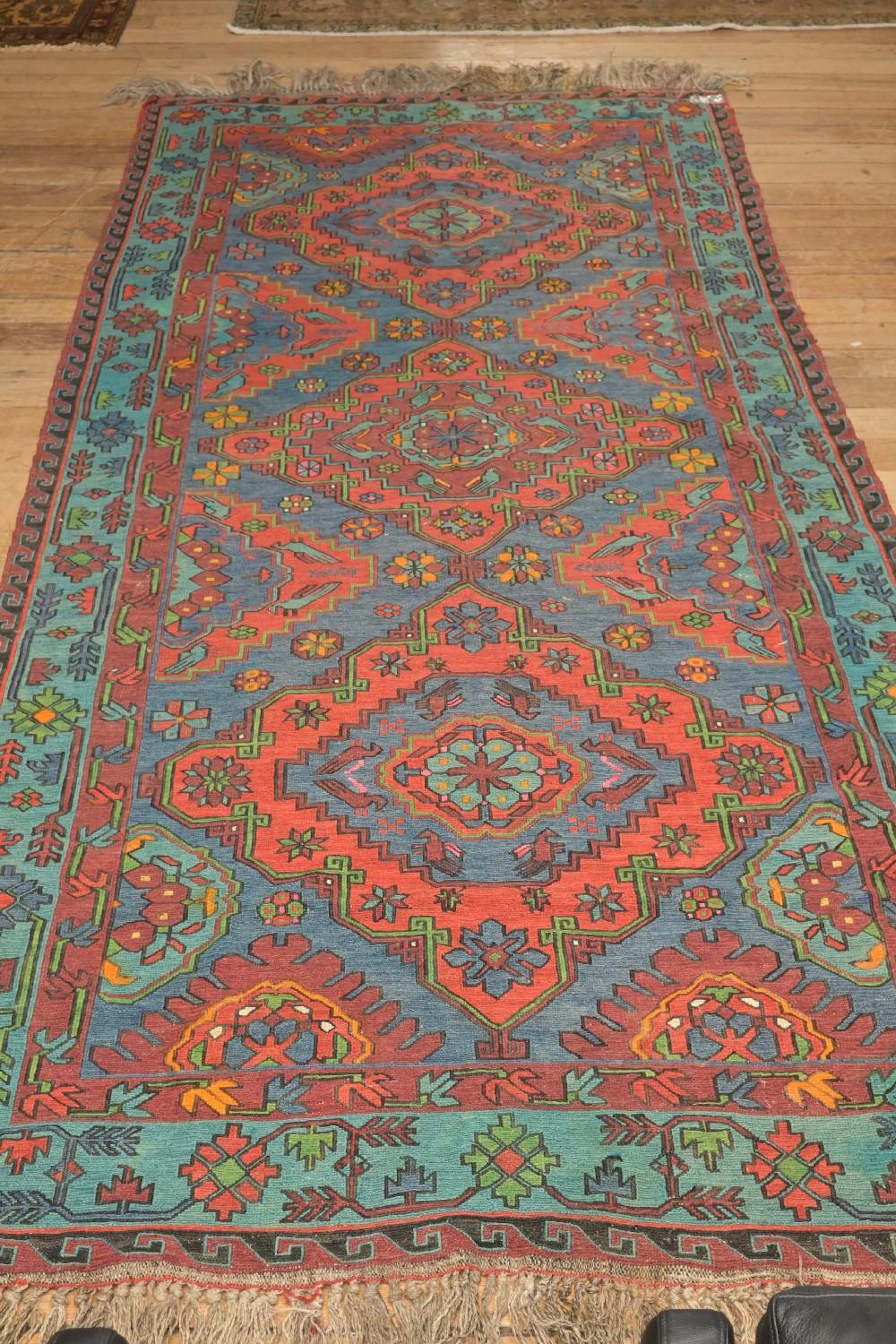 AN EGYPTIAN HANDMADE FLAT WEAVE RUG (A/F) (354 X 147 CM)...