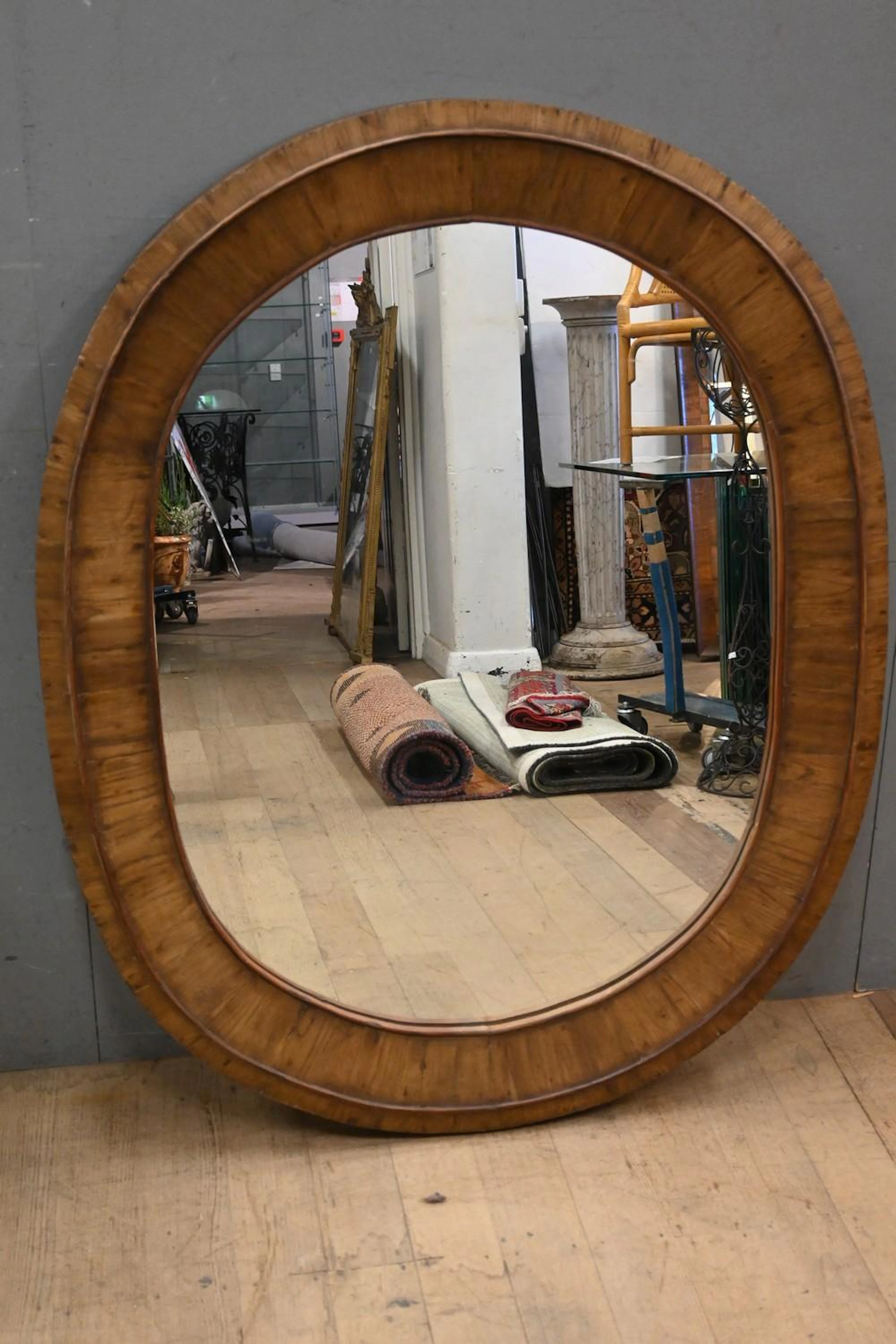 AN OAK SCANDINAVIAN COUNTRY STYLE MIRROR ( 132H X 104W...