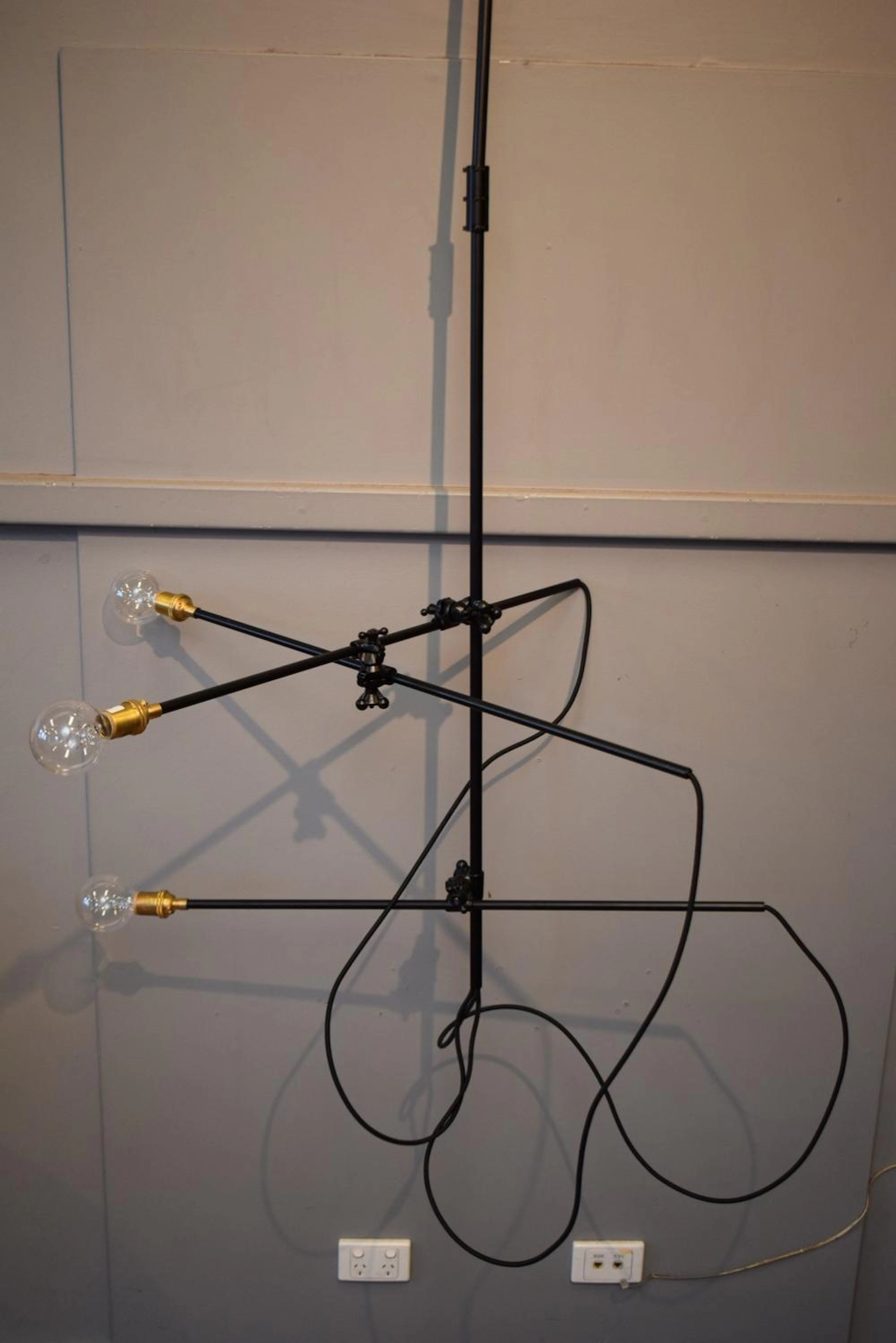 AN 'INDUSTRIAL CHANDELIER' BY WORKSTEAD USA, WITH INSTRUCTION MANUAL