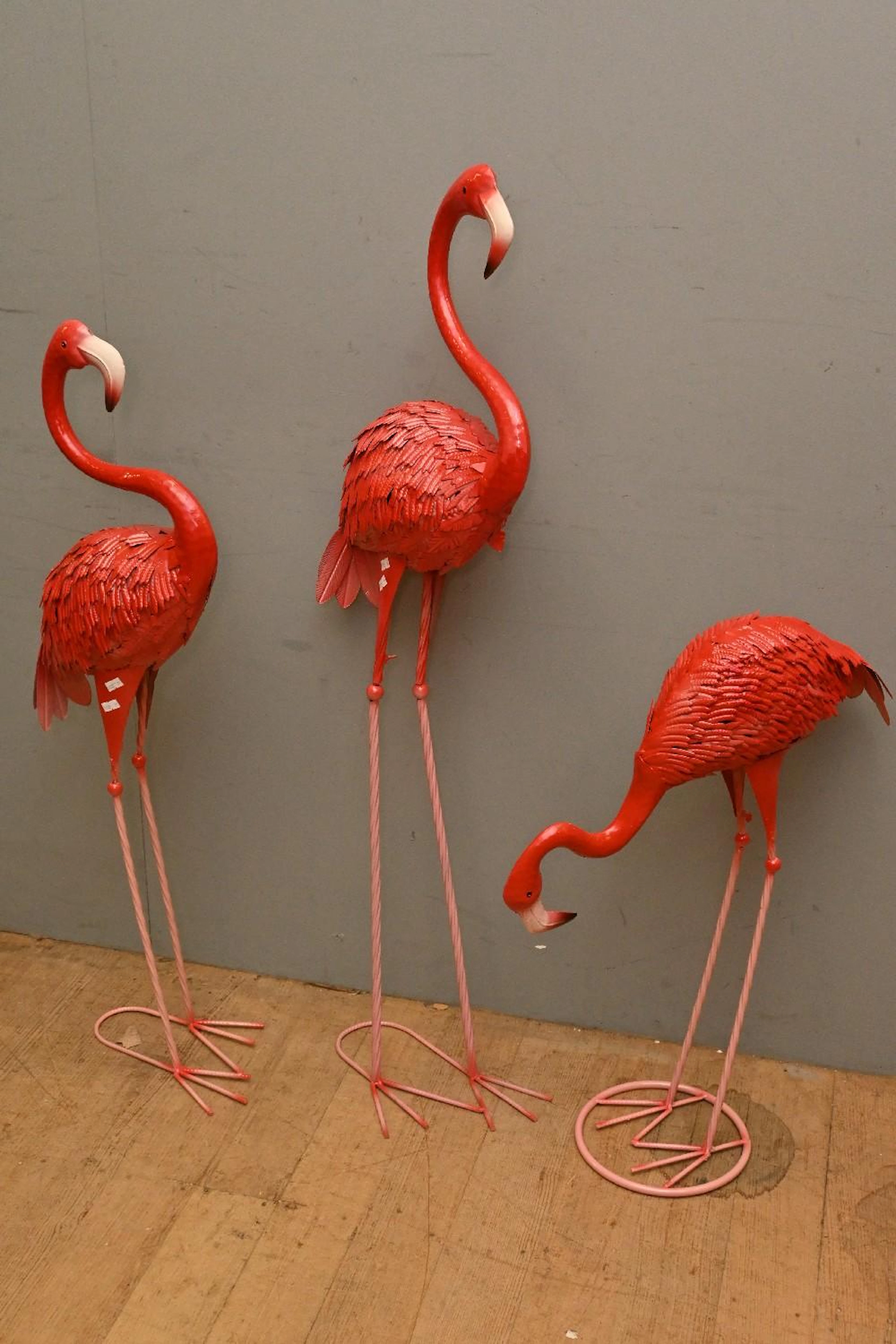 A SET OF THREE METAL GARDEN FLAMINGOES (123H CM) (LEONARD...