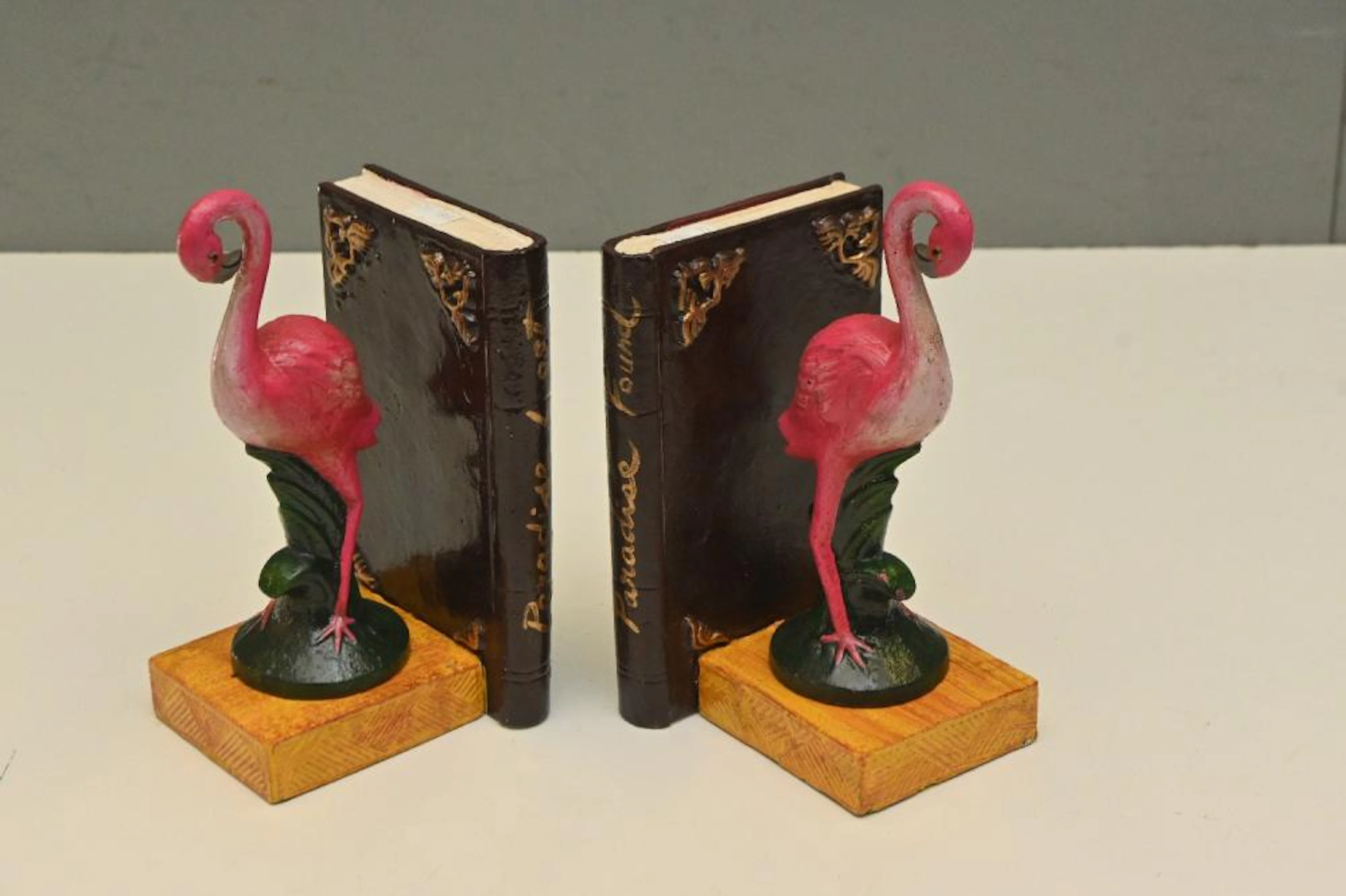 A PAIR OF CAST METAL FLAMINGO BOOKENDS (20H CM) (LEONARD...