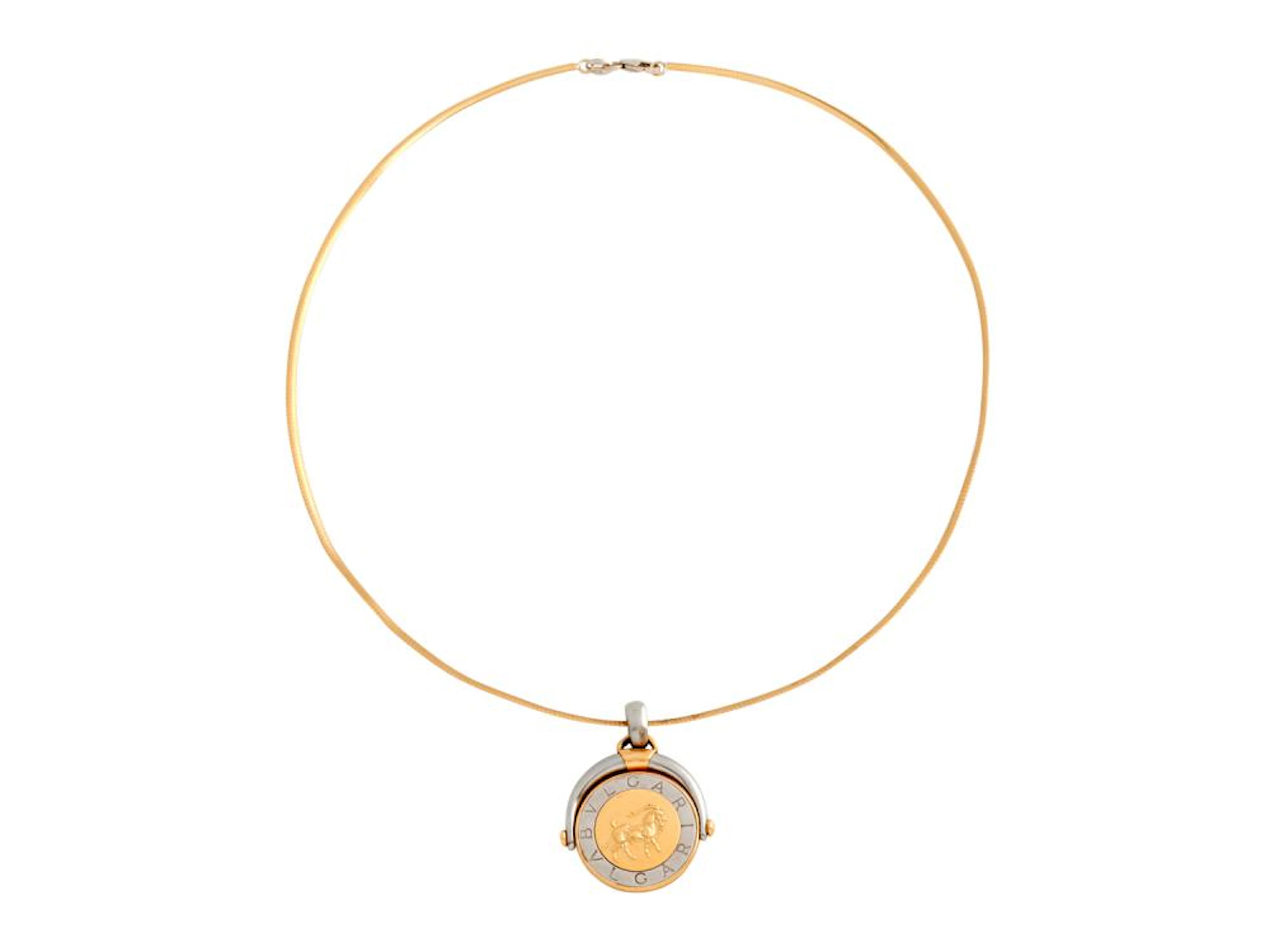 BULGARI, 18CT GOLD AND STAINLESS STEEL 'ZODIAC' PENDANT
