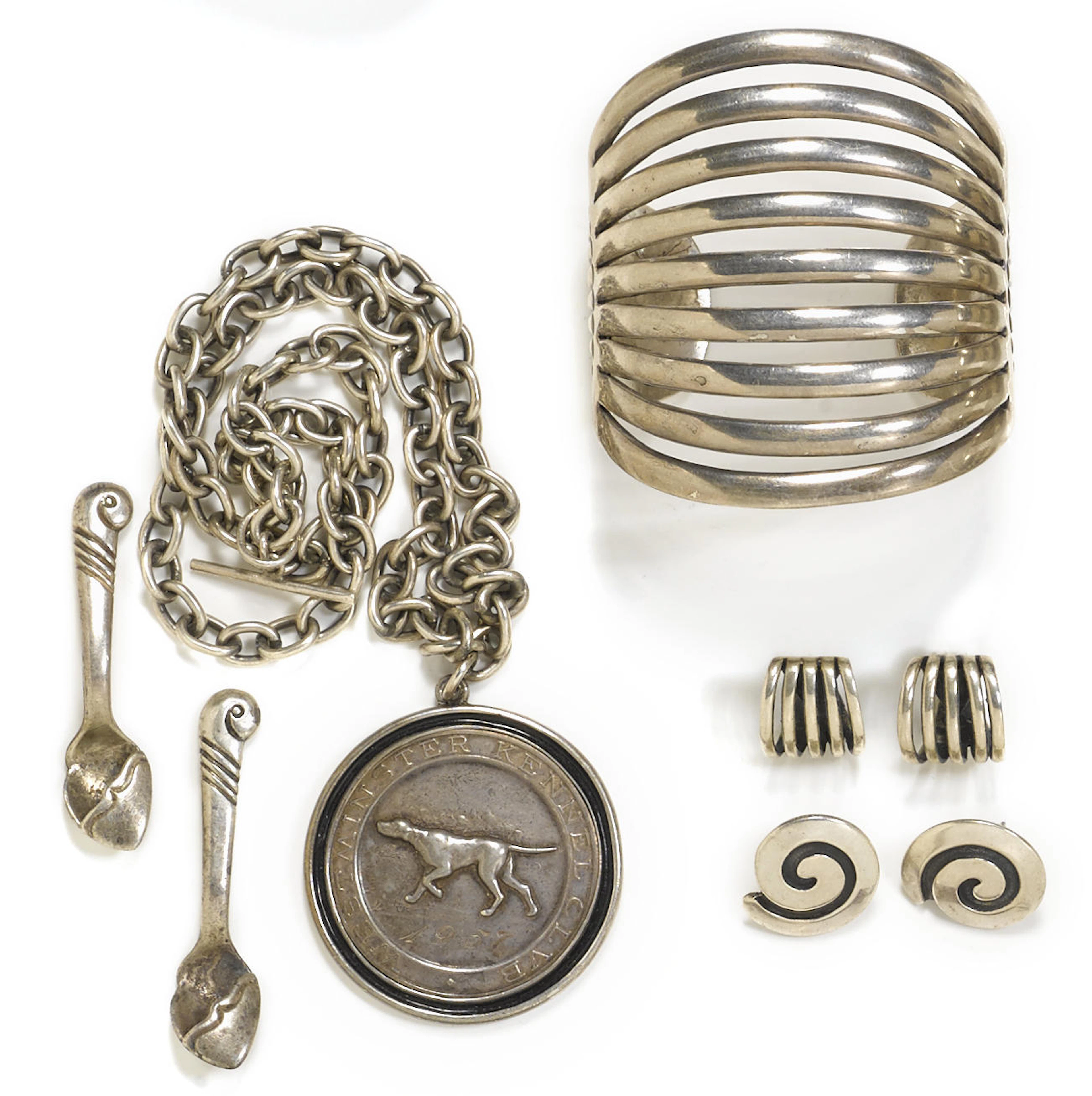 A group of Navajo White Hogan jewelry items