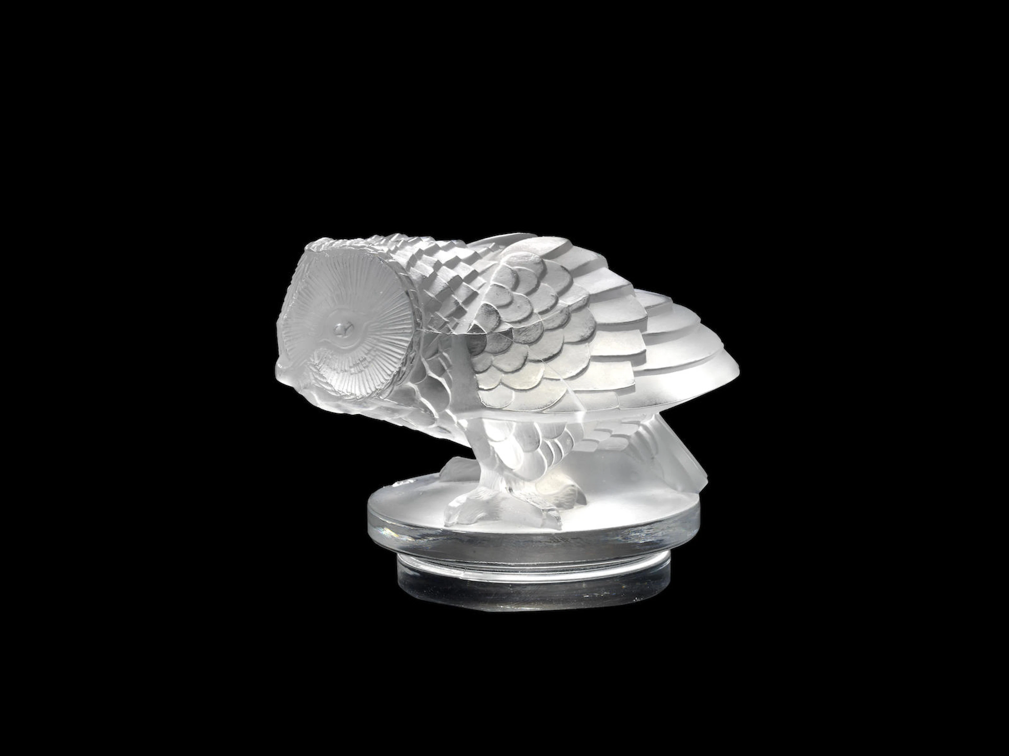 A fine and rare 'Hibou' glass mascot by René Lalique, French, introduced 27th January 1931,