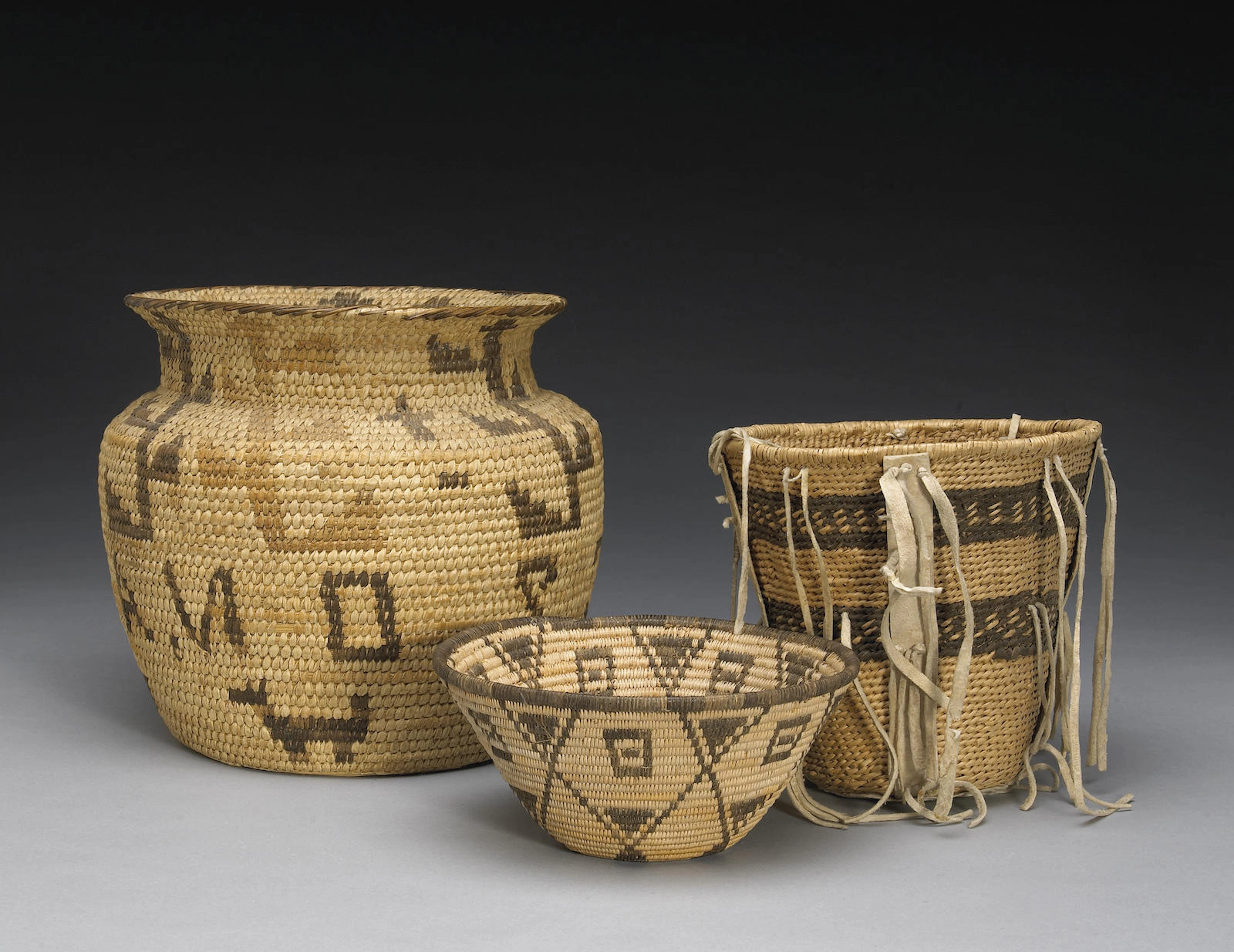 Three Southwest baskets height 8 1/2, 6 1/4 and 3 1/4in