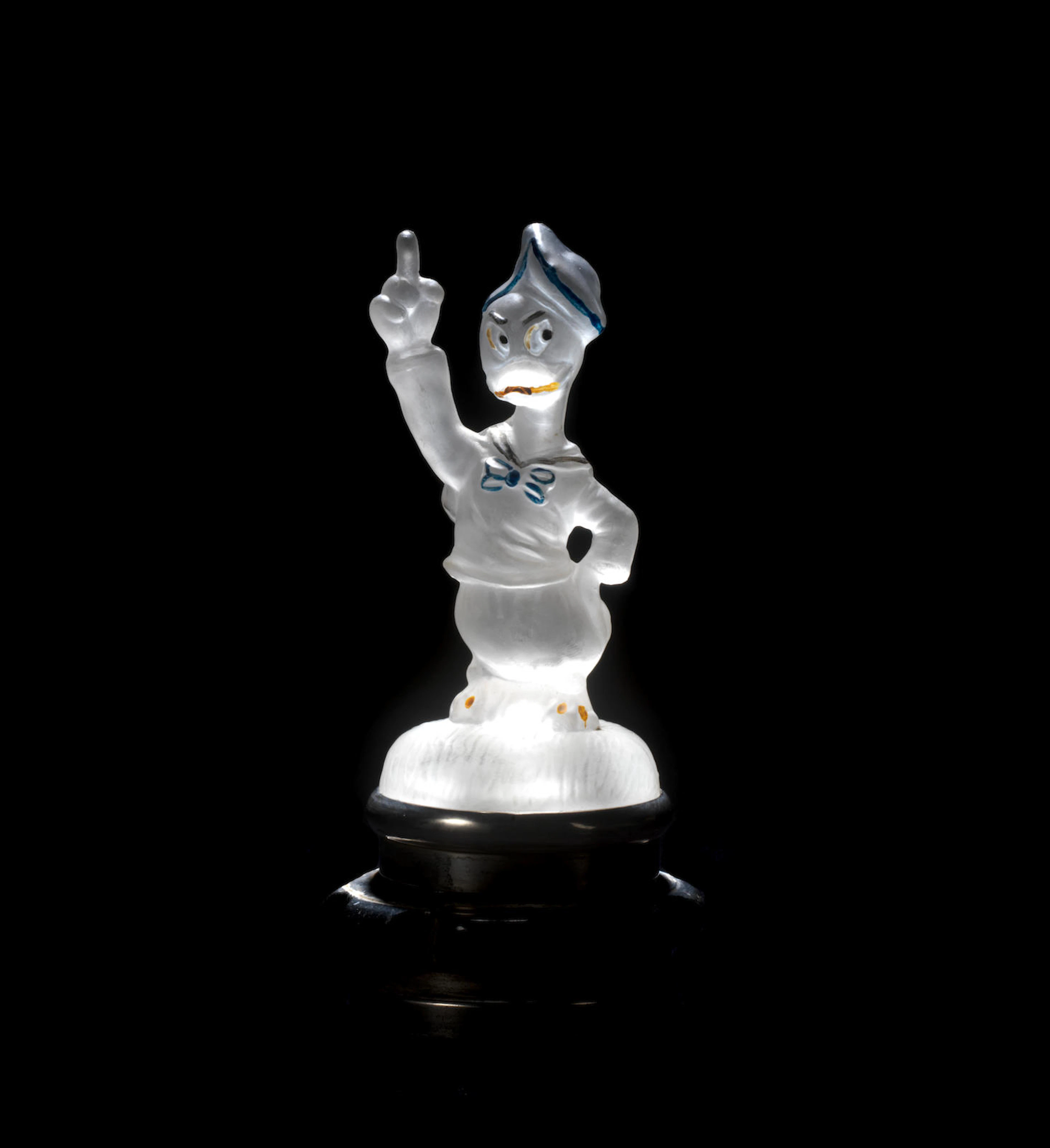 A 'Donald Duck' glass mascot by the American Cut-Crystal Corporation of Italy,