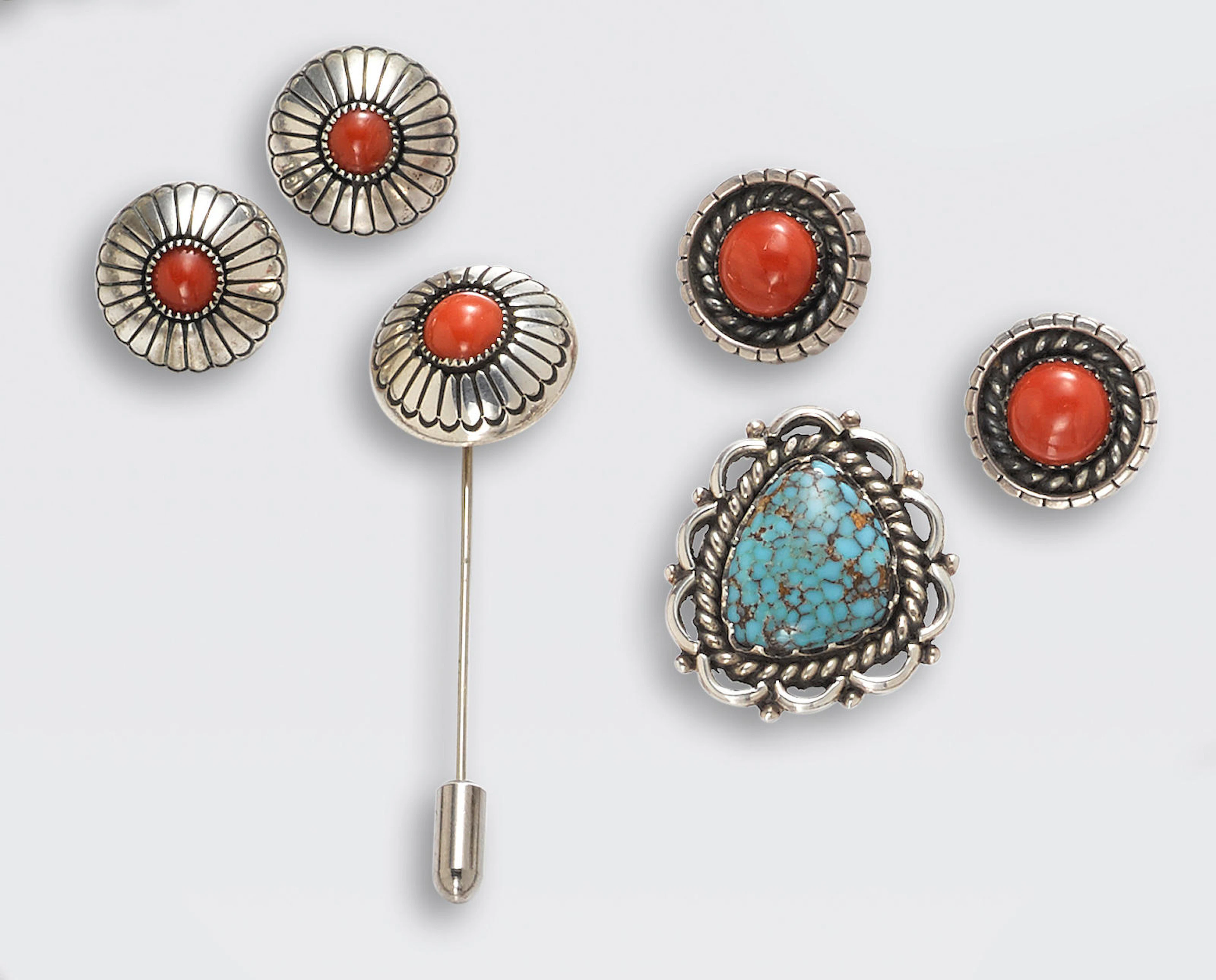 Two Lee Yazzie jewelry items