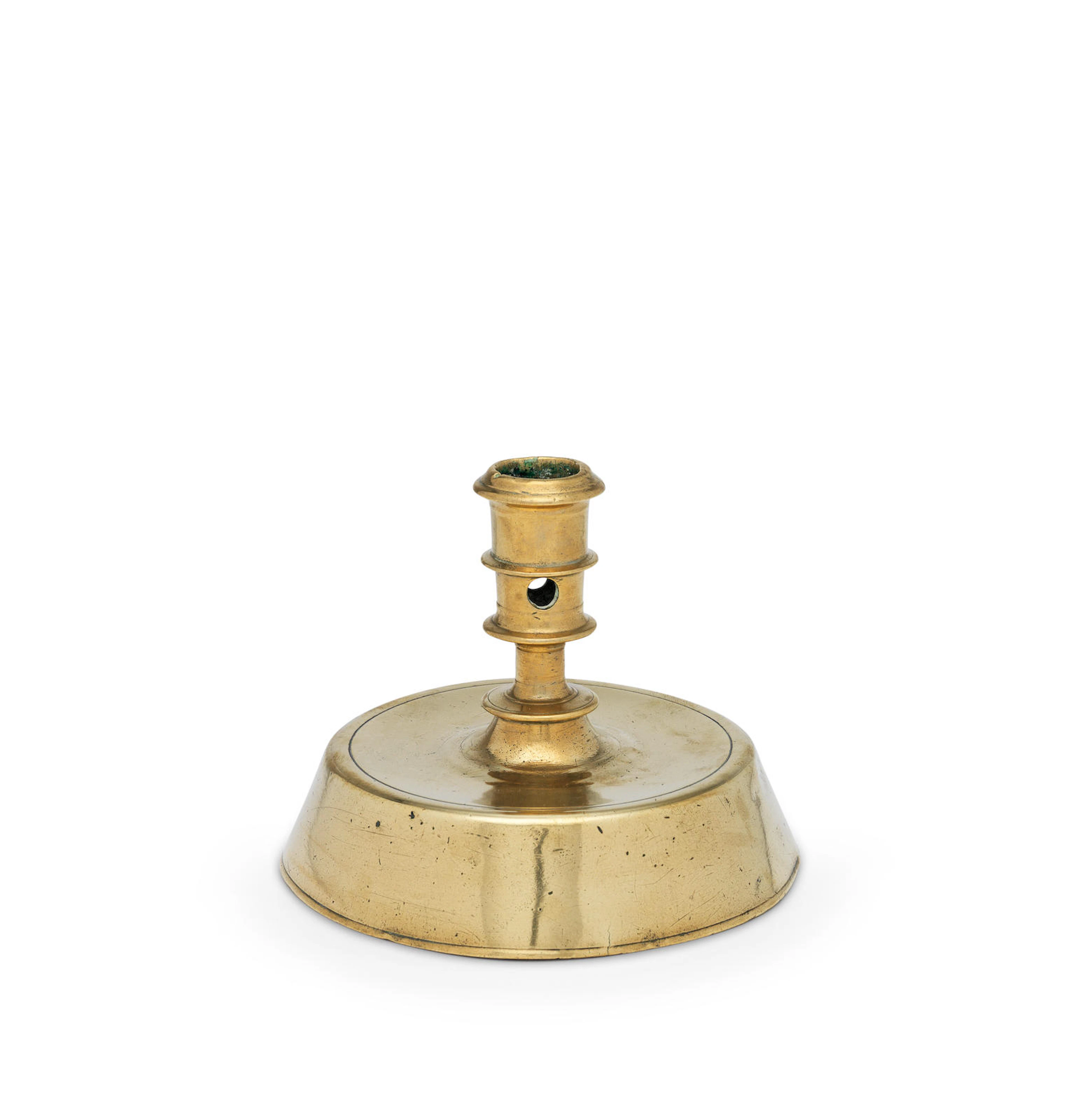 An early 16th century copper alloy socket candlestick, of 'Mary Rose' type, possibly Spanish, possibly North-West European