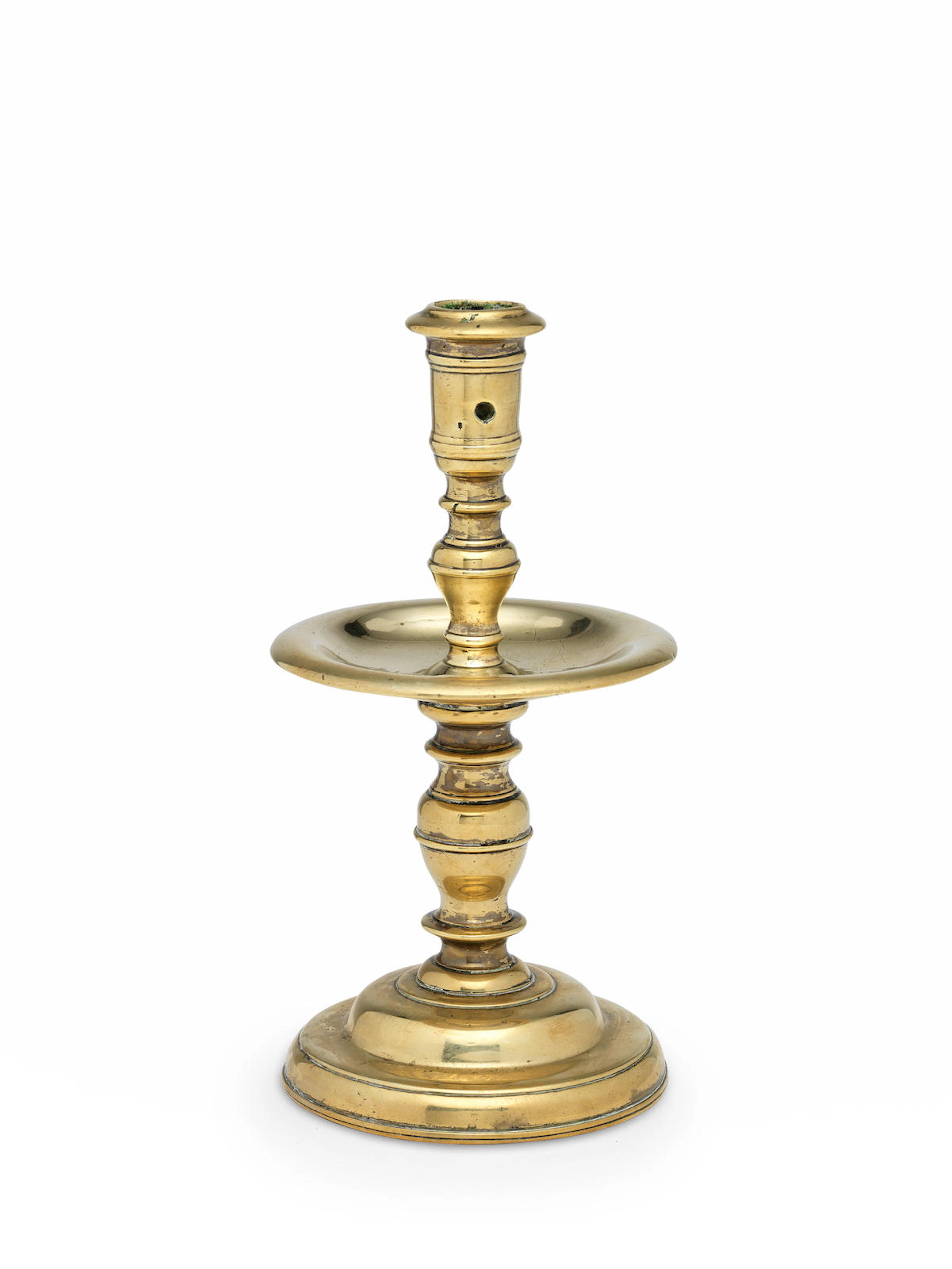 A mid- to late 17th century copper alloy socket candlestick, of 'Heemskirk'-type, North-West European