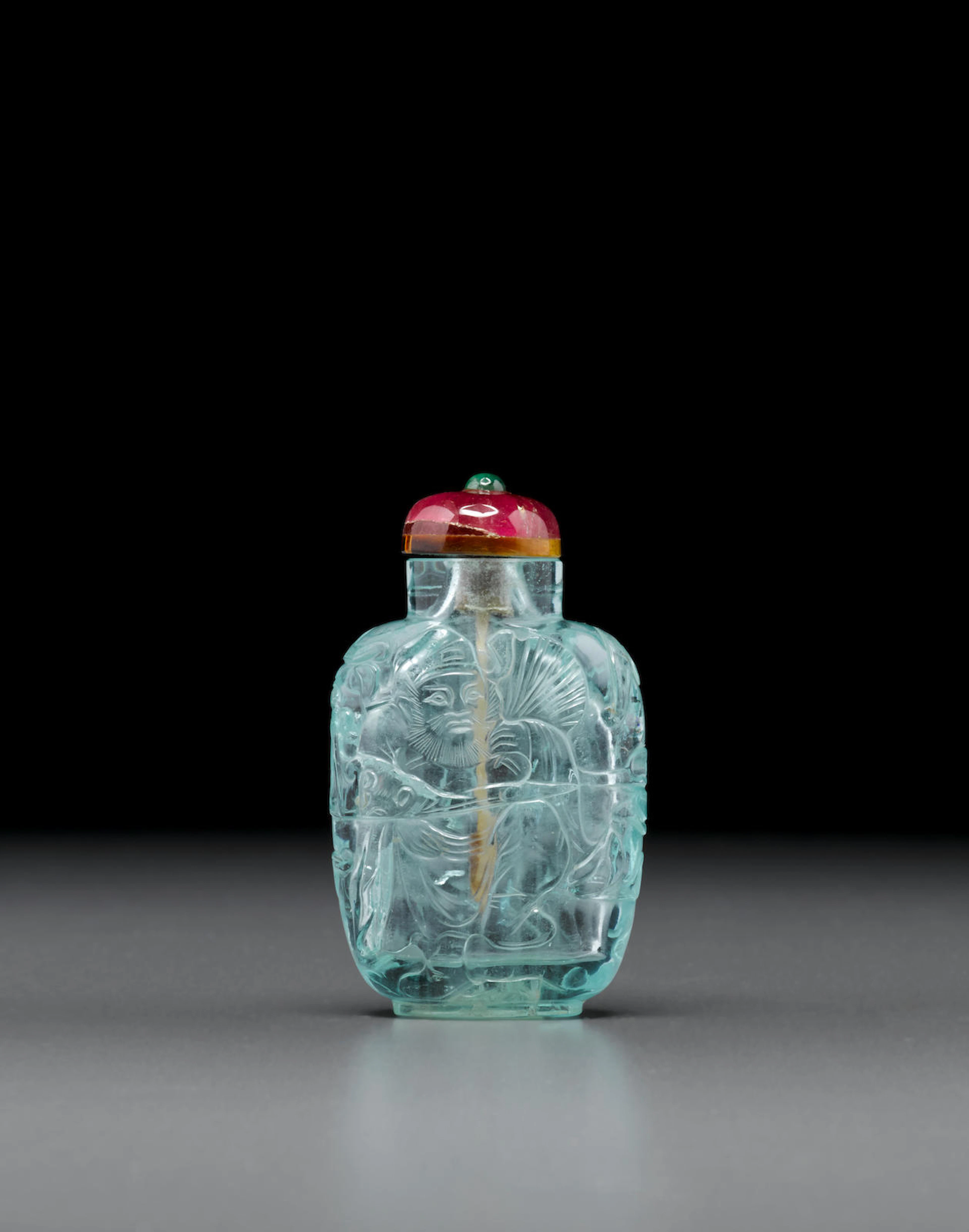 An aquamarine snuff bottle carved with Ji Gong 1850-1920