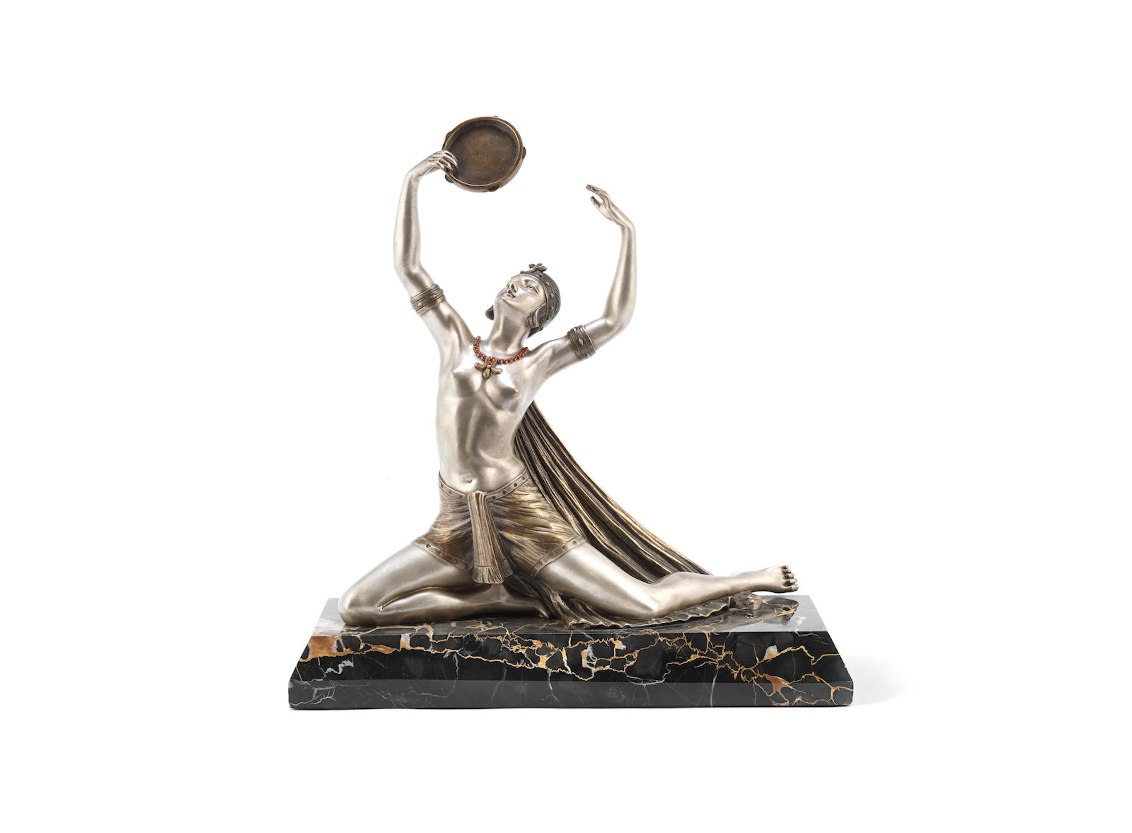 a stylish art deco silvered bronze study of a bare-breasted female tambourine dancer by Henri Fugère SIGNED IN CAST, CIRCA 1925