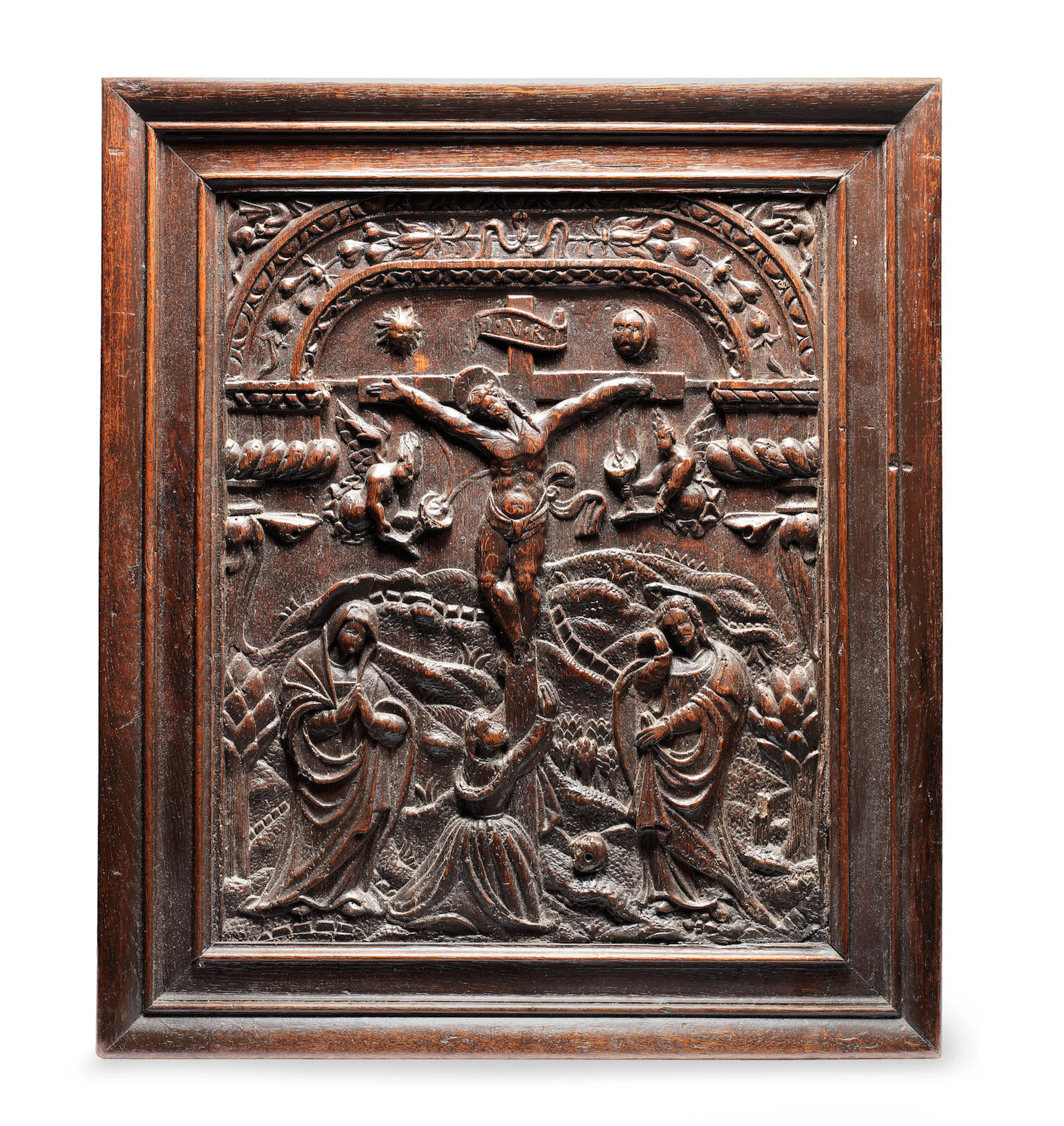 A late 16th century carved oak panel of the Crucifixion, just before the Deposition, of Christ, Flemish/German