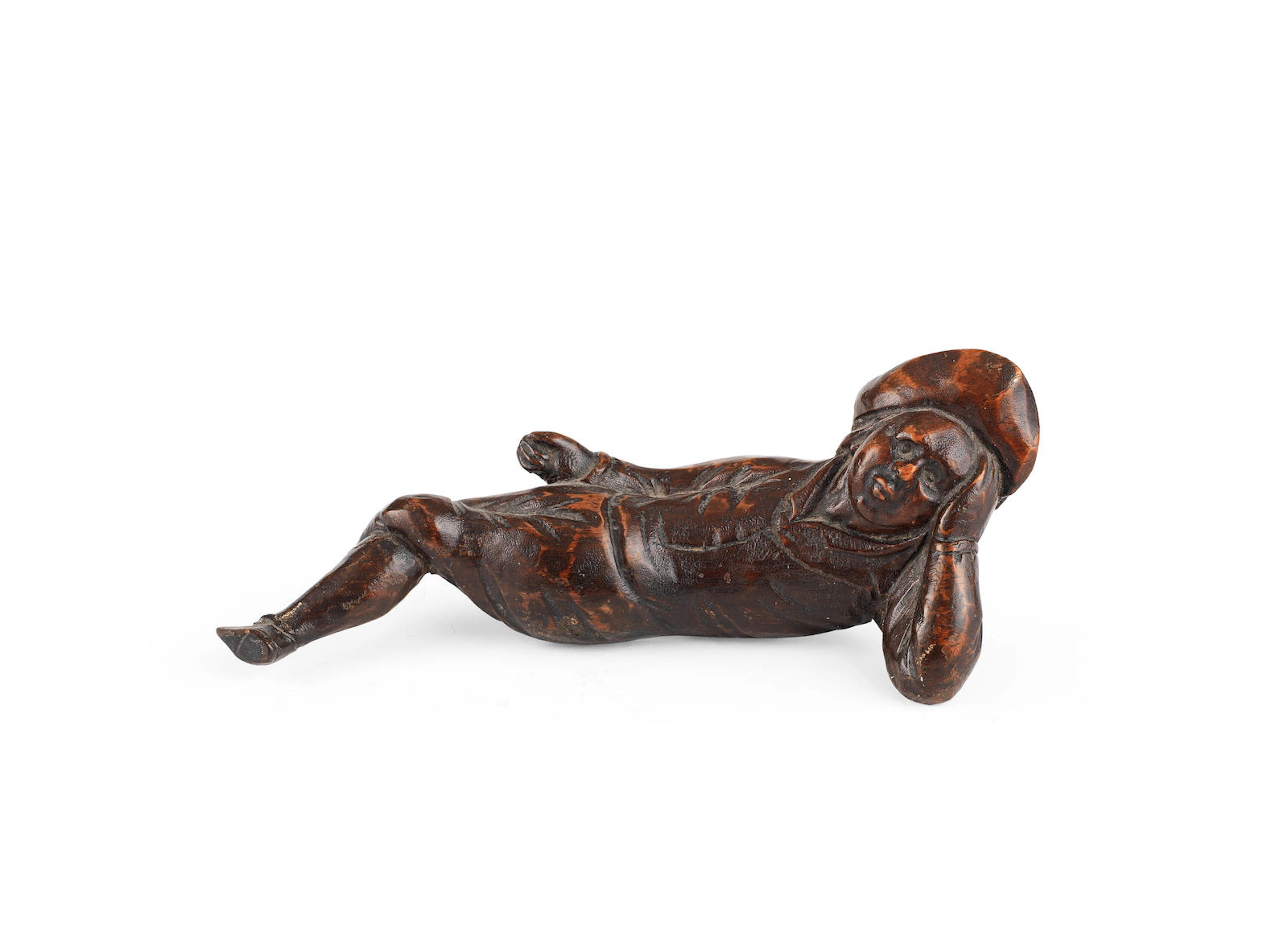 An early to mid-18th century small 'fruitwood' figural carving, English, probably North Country