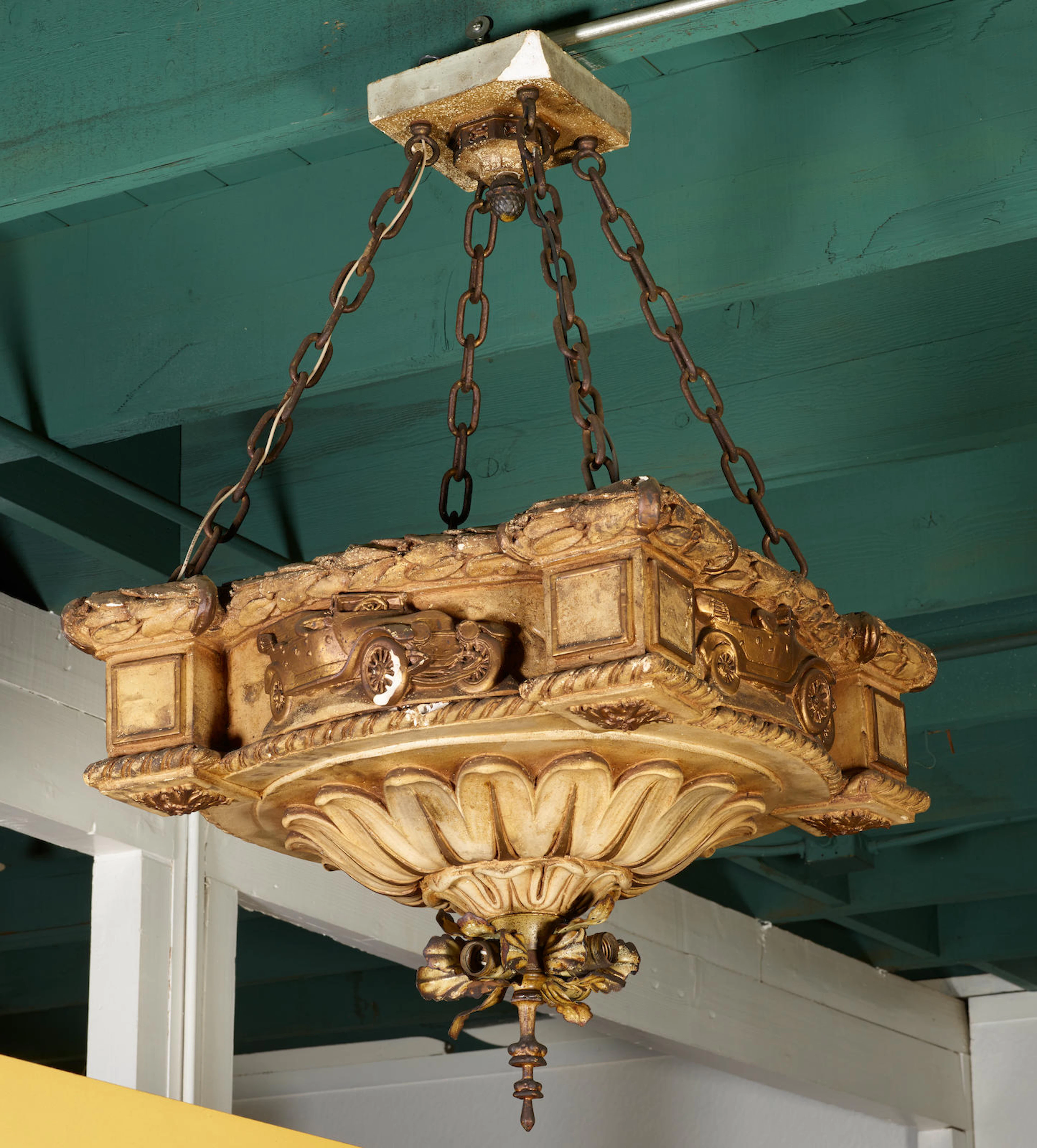 A pair of motoring themed decorative hanging lamps, early 20th century,