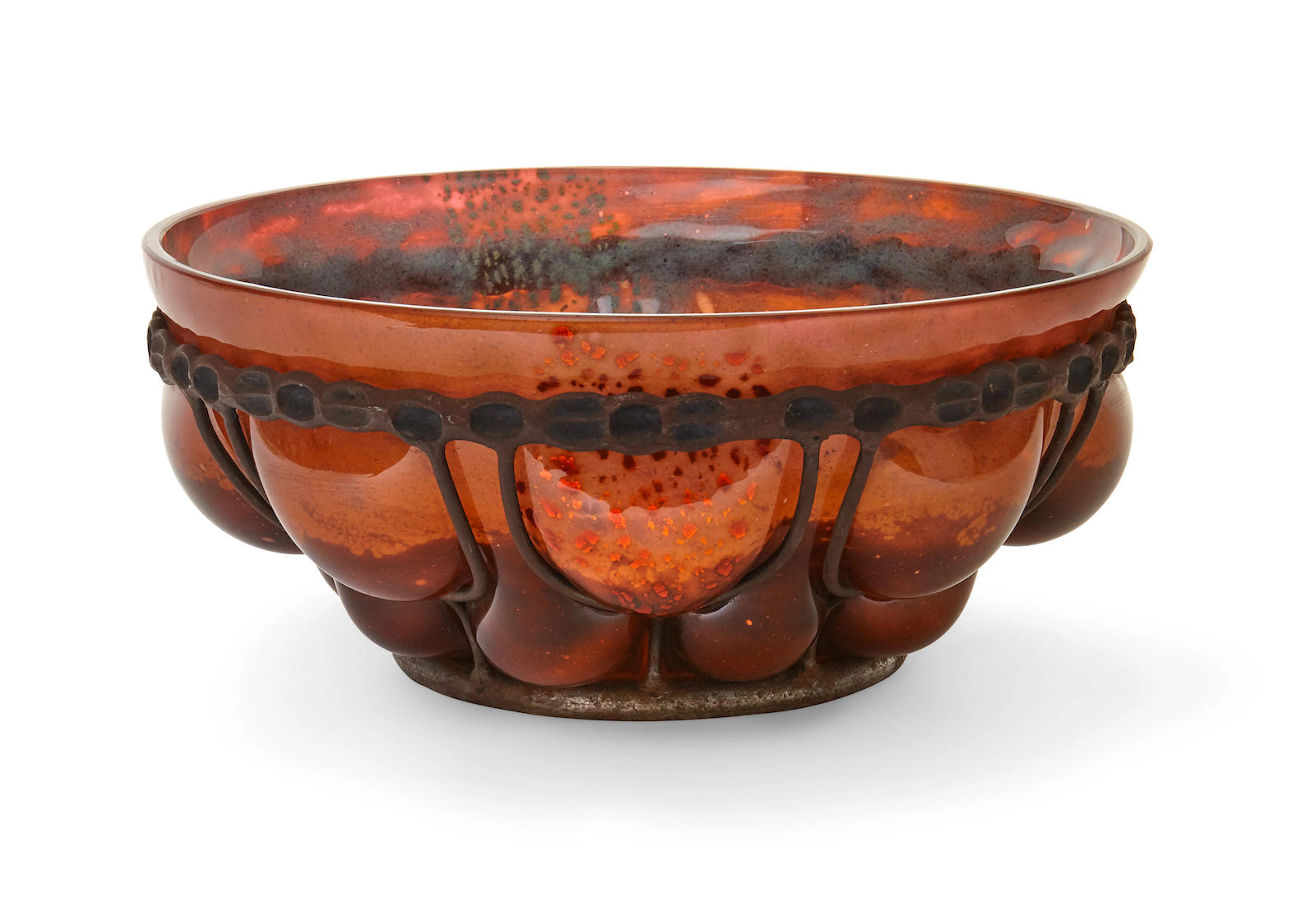 A Louis Majorelle wrought iron and Daum Frères mottled glass Bowlcirca 1925 with foil inclusions, signed L. Majorelle and DAUM NANCY FRANCE with the cross of Lorraine height 5in (12