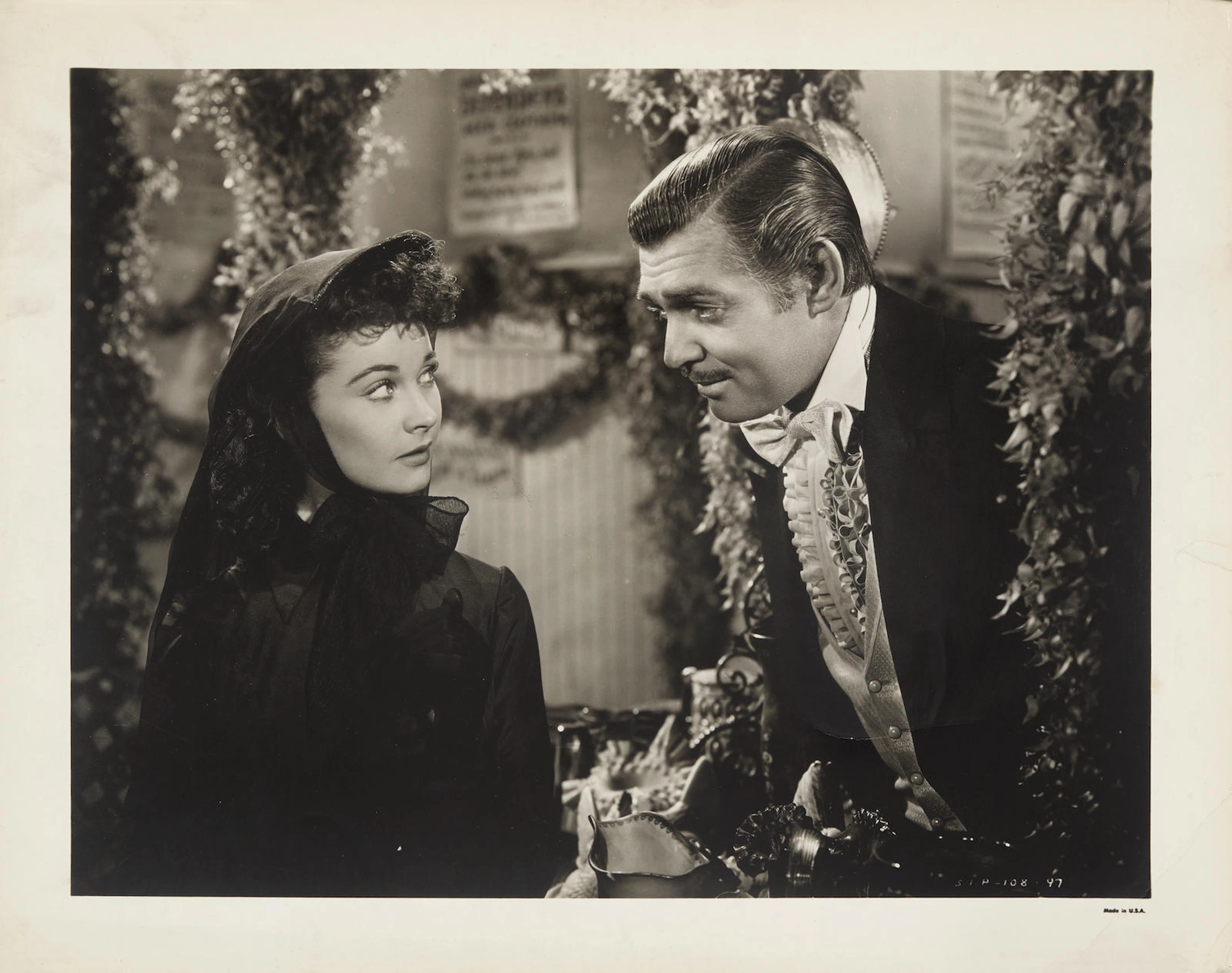 A group of oversized vintage photographs of Clark Gable and Vivien Leigh in Gone With the Wind