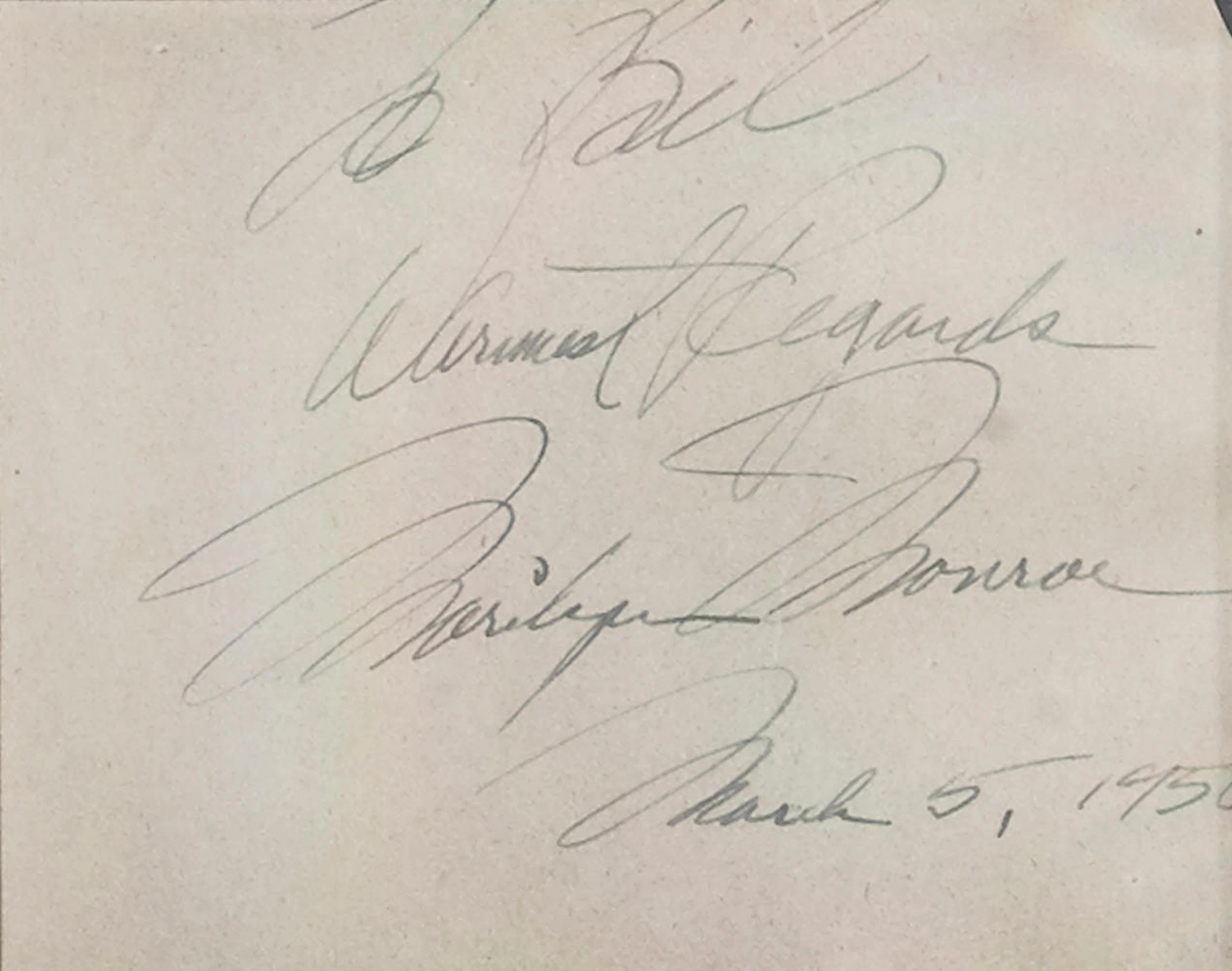 A Marilyn Monroe autograph framed with Milton H. Greene photographs
