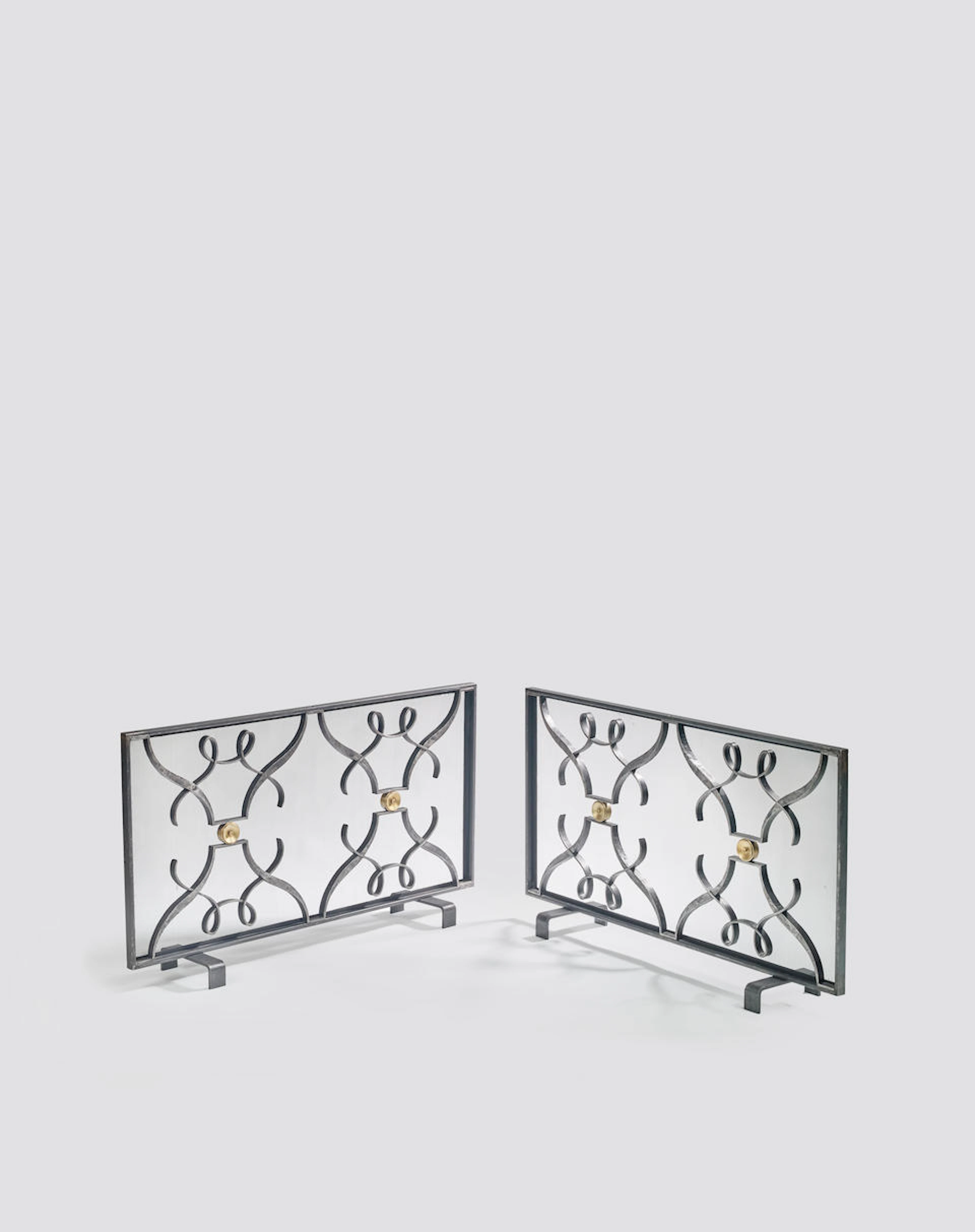 ATTRIBUTED TO RAYMOND SUBES (1873-1970) Pair of Fire...