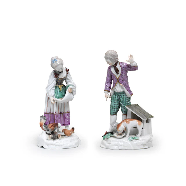 A rare pair of Fulda figures of a man and woman feeding animals, circa 1770-75