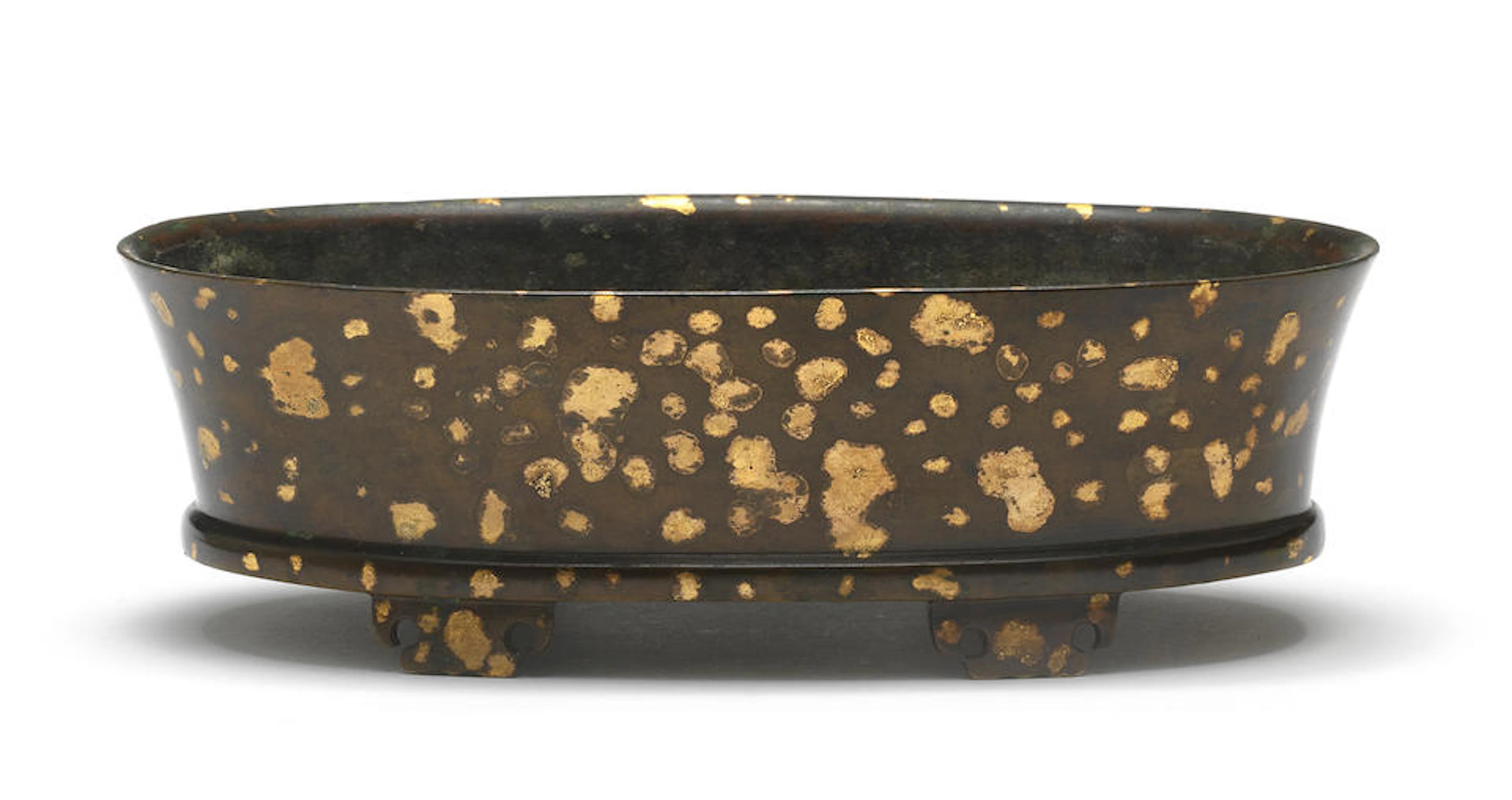 A RARE GOLD-SPLASHED BRONZE OVAL INCENSE BURNER Xuande six-character mark
