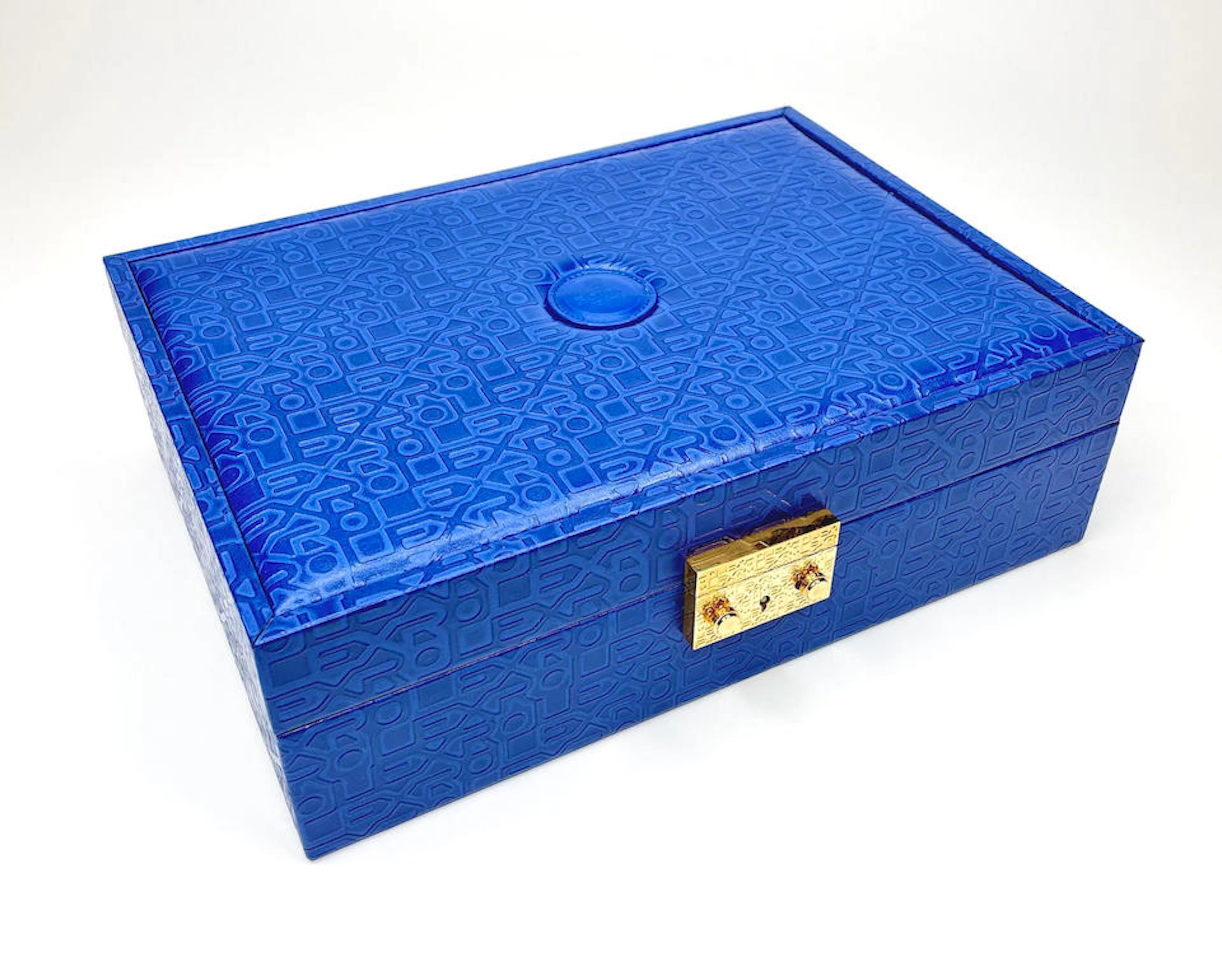 Rolex. A Blue Leatherette Box, with key