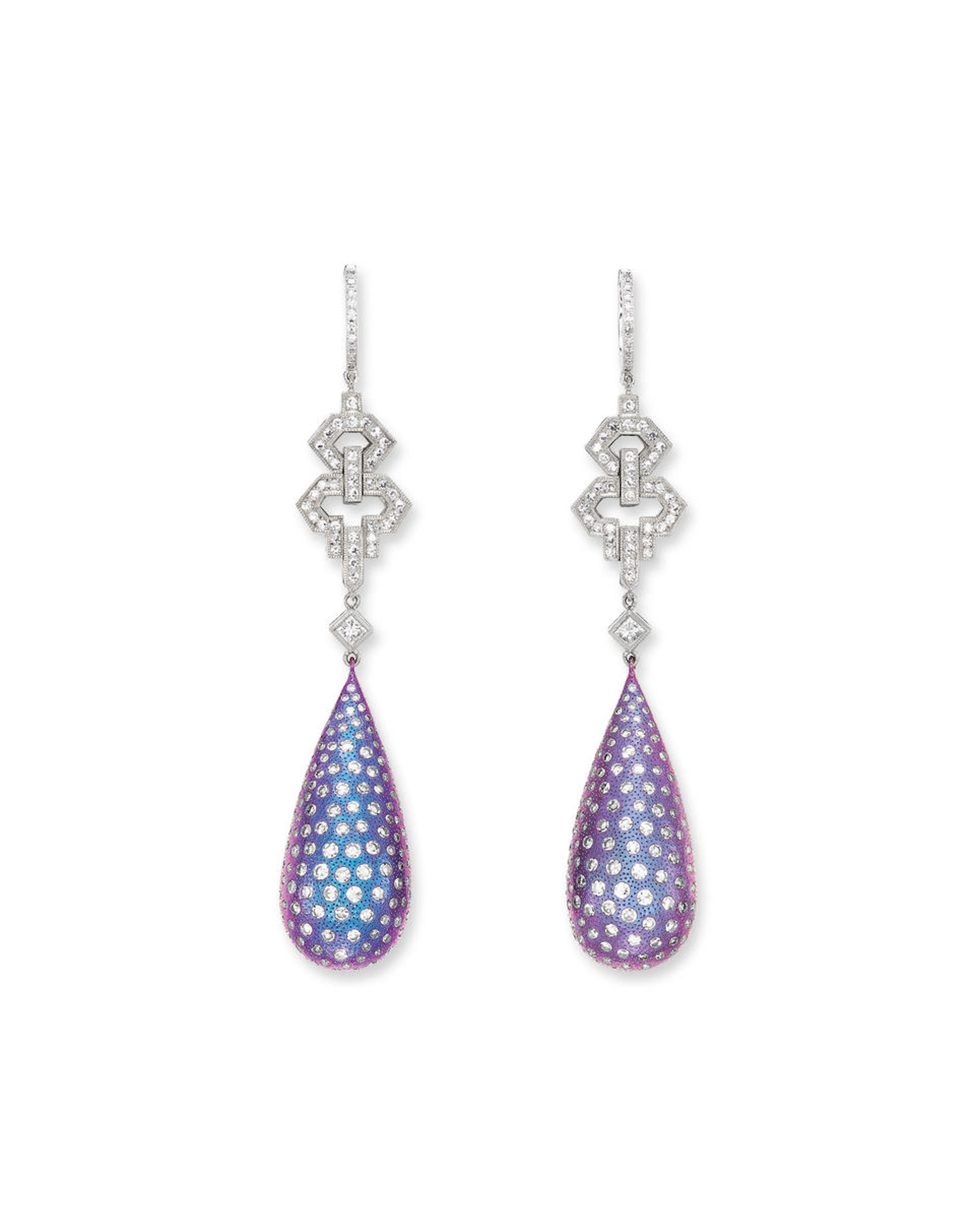 A PAIR OF TITANIUM AND DIAMOND EARRINGS