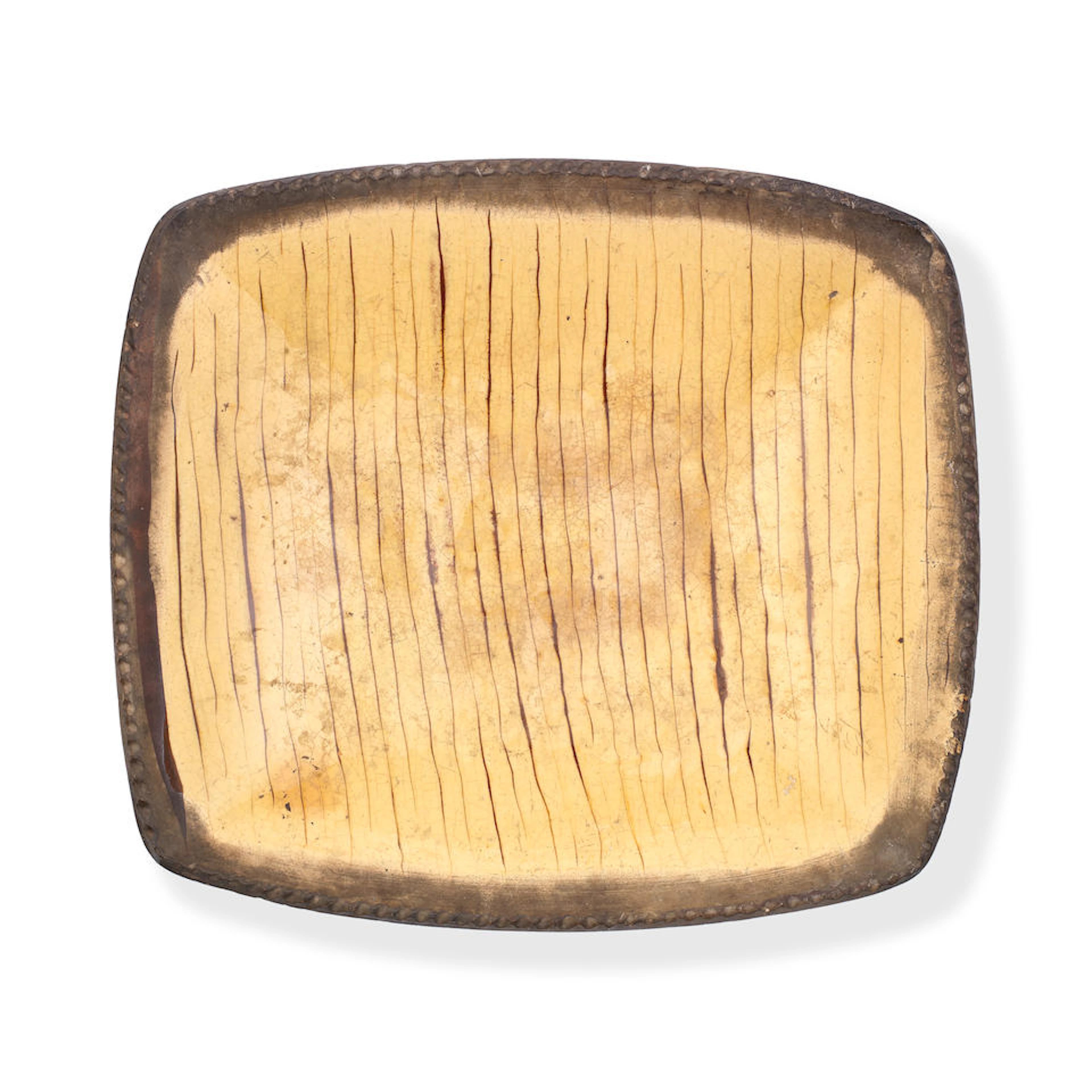 A Staffordshire slipware dish, 18th century