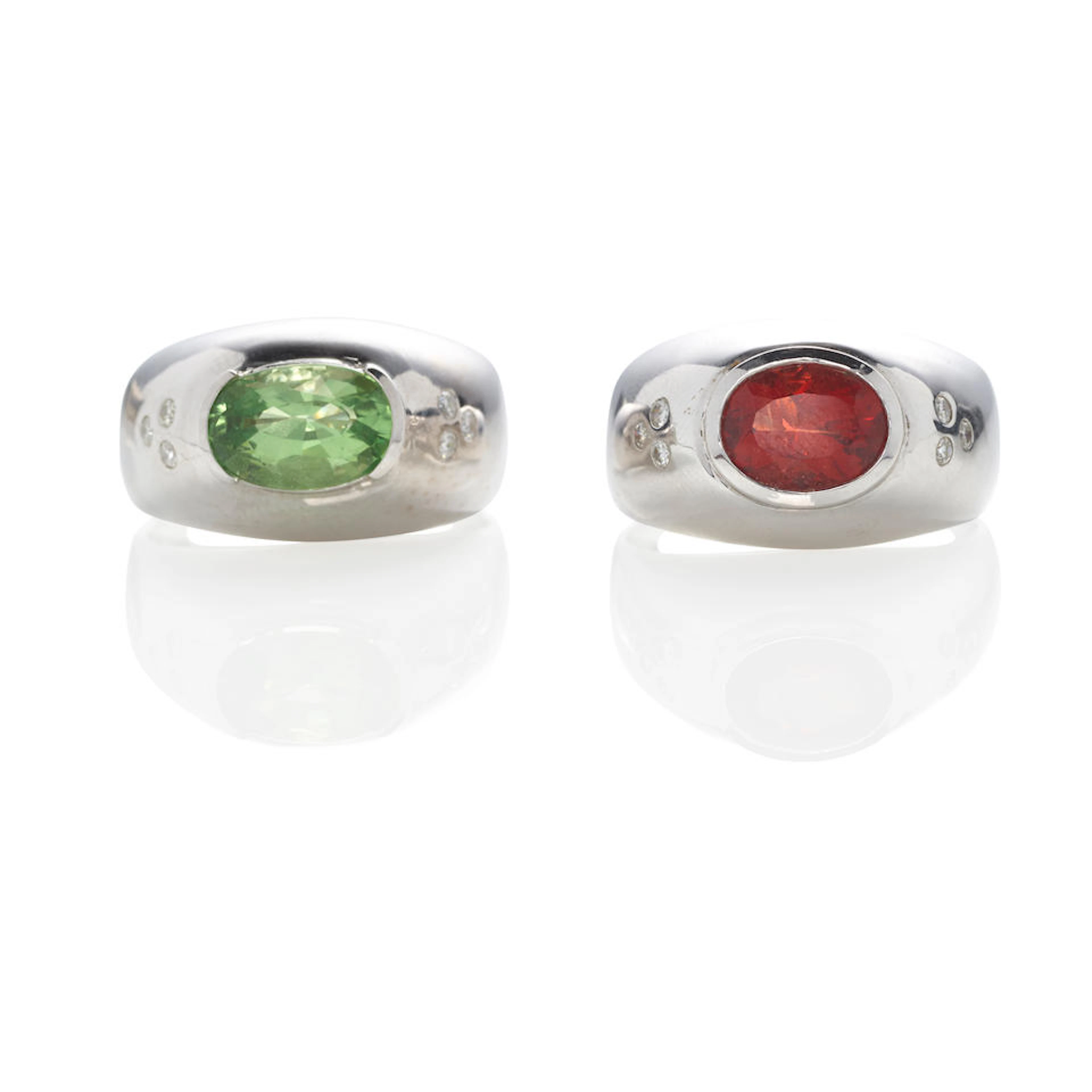 TWO WHITE GOLD AND GEM-SET RINGS