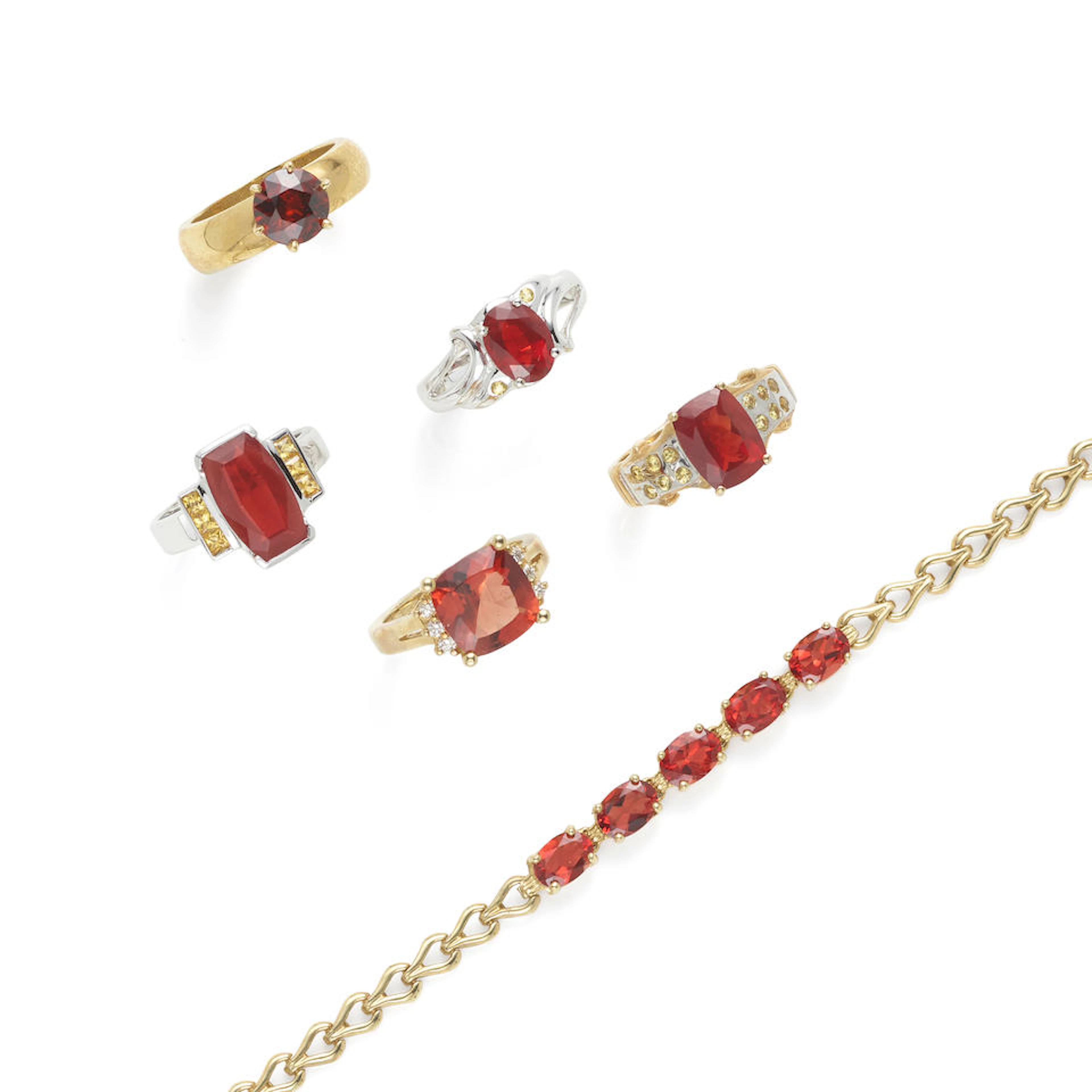 COLLECTION OF GOLD AND SUNSTONE JEWELRY