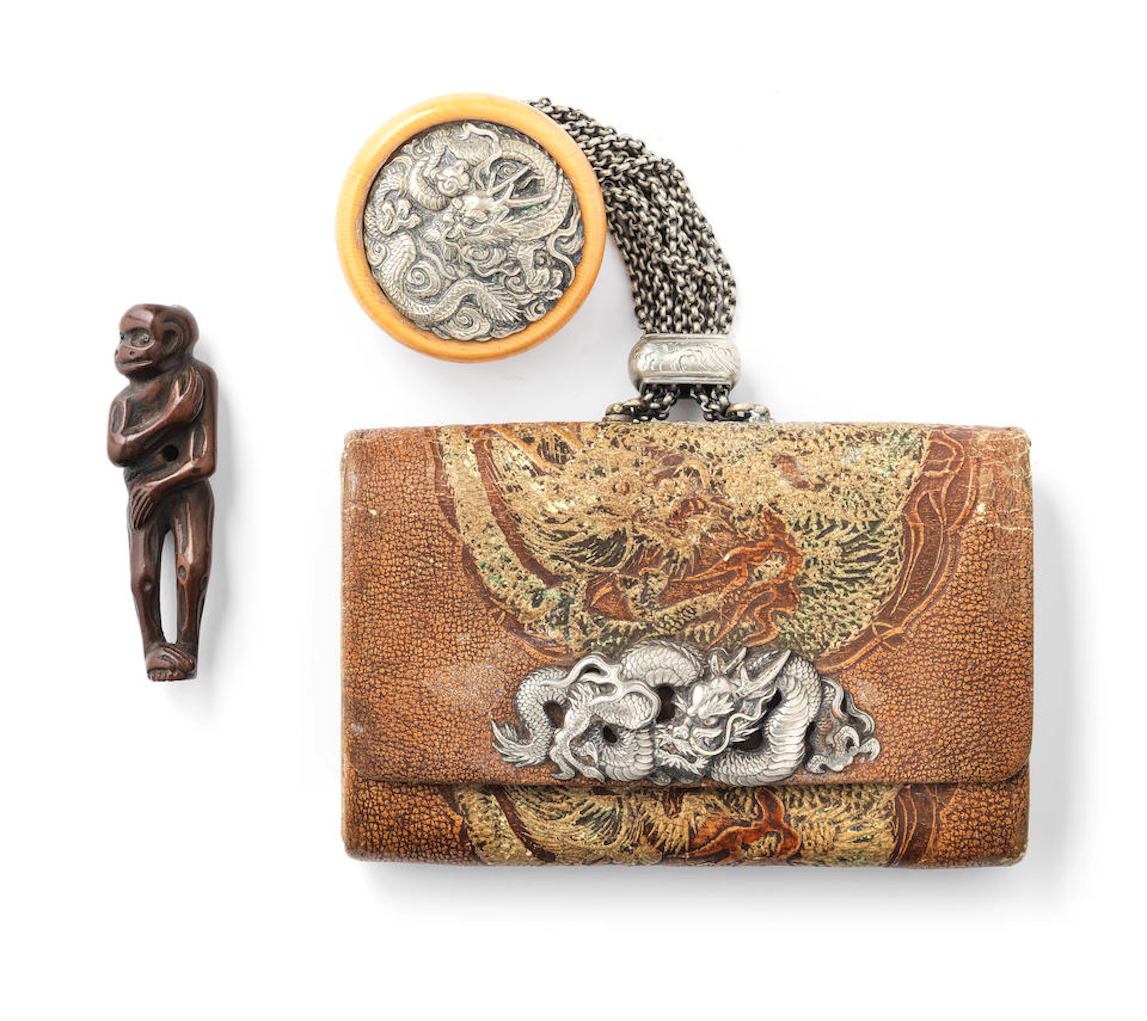 A tabako-ire (tobacco pouch) with kagamibuta netsuke and...