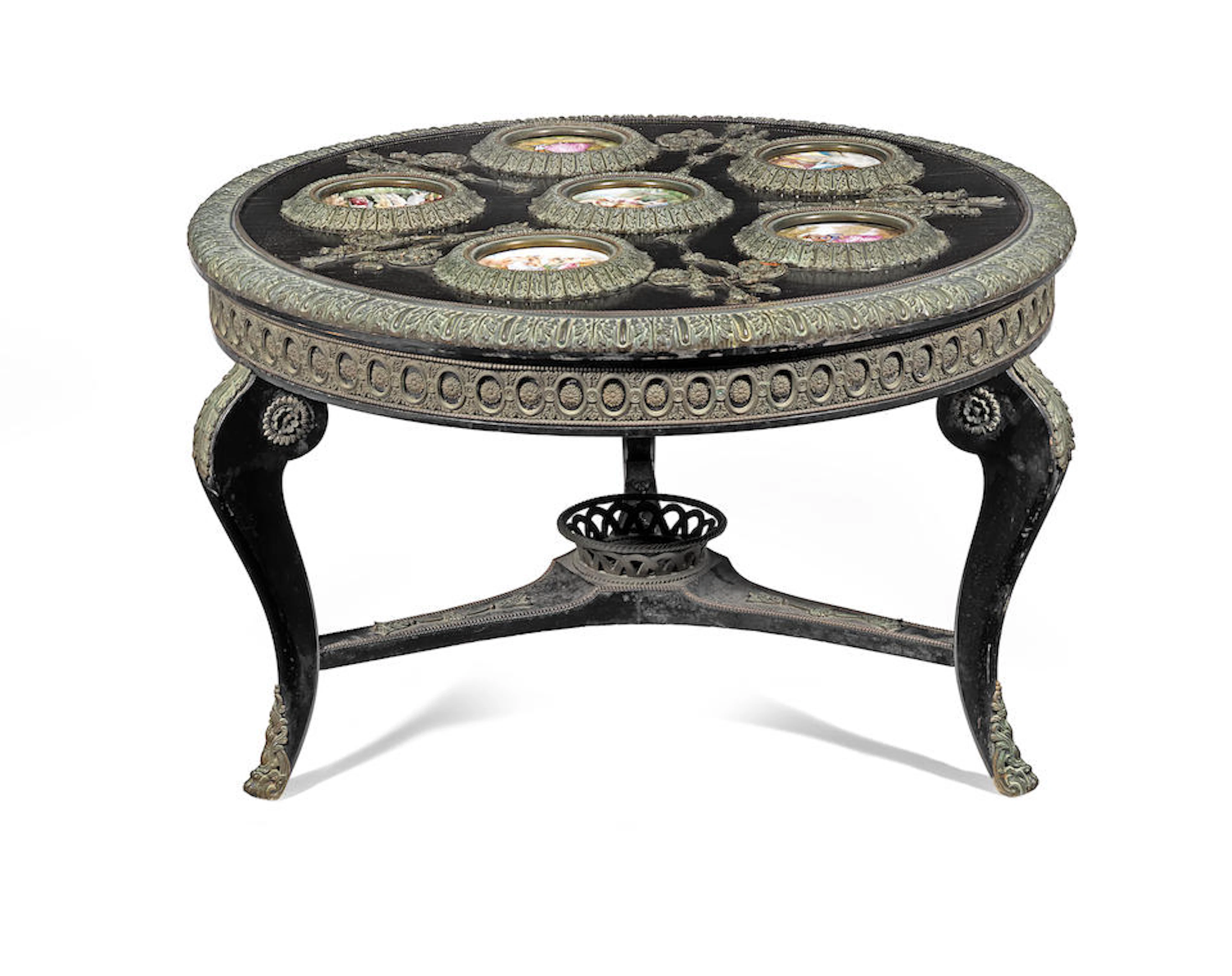 A French early 20th century ebony and ebonised low table...