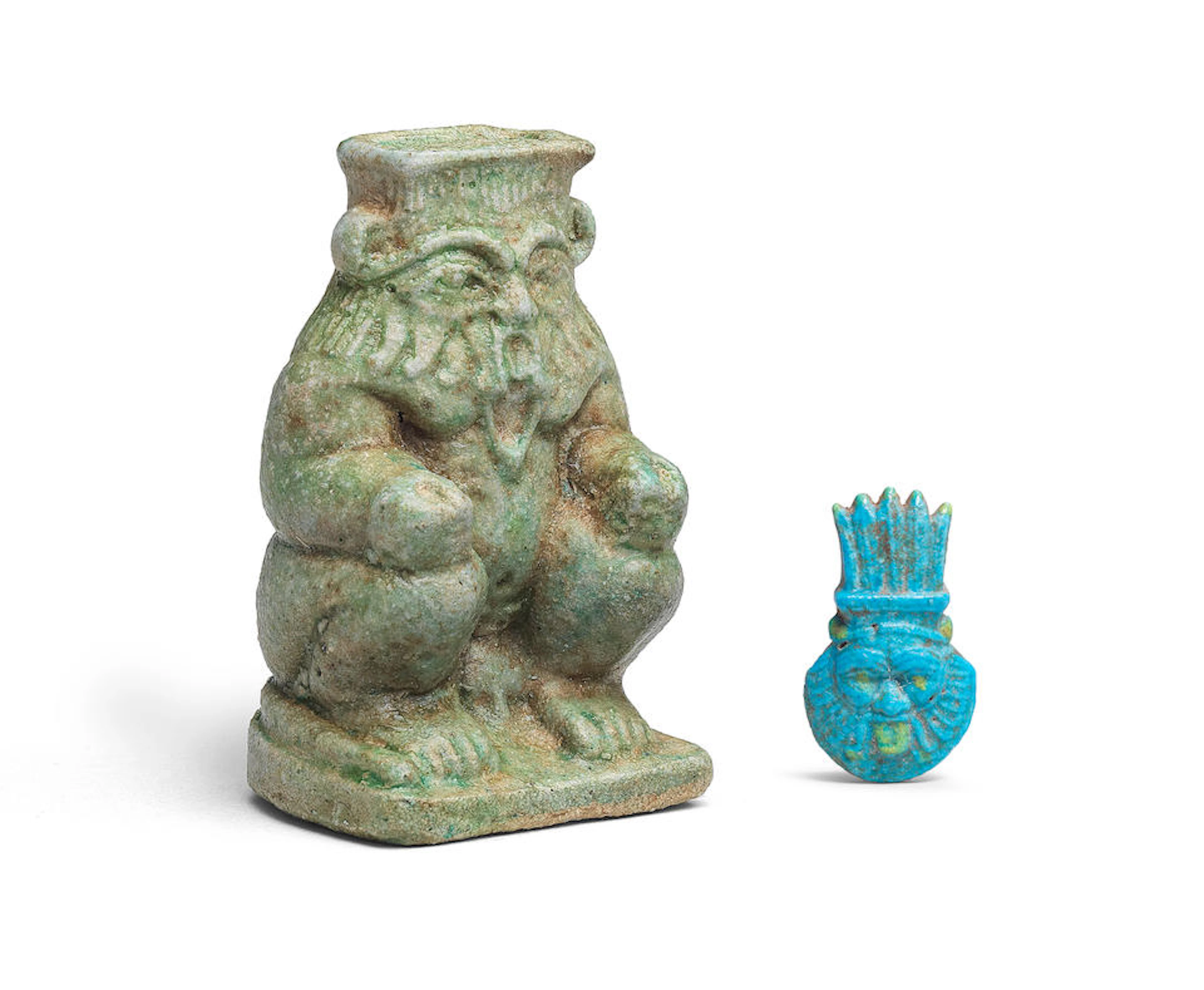 An Egyptian green faience seated Bes and an Egyptian blue faience Bes amulet 2