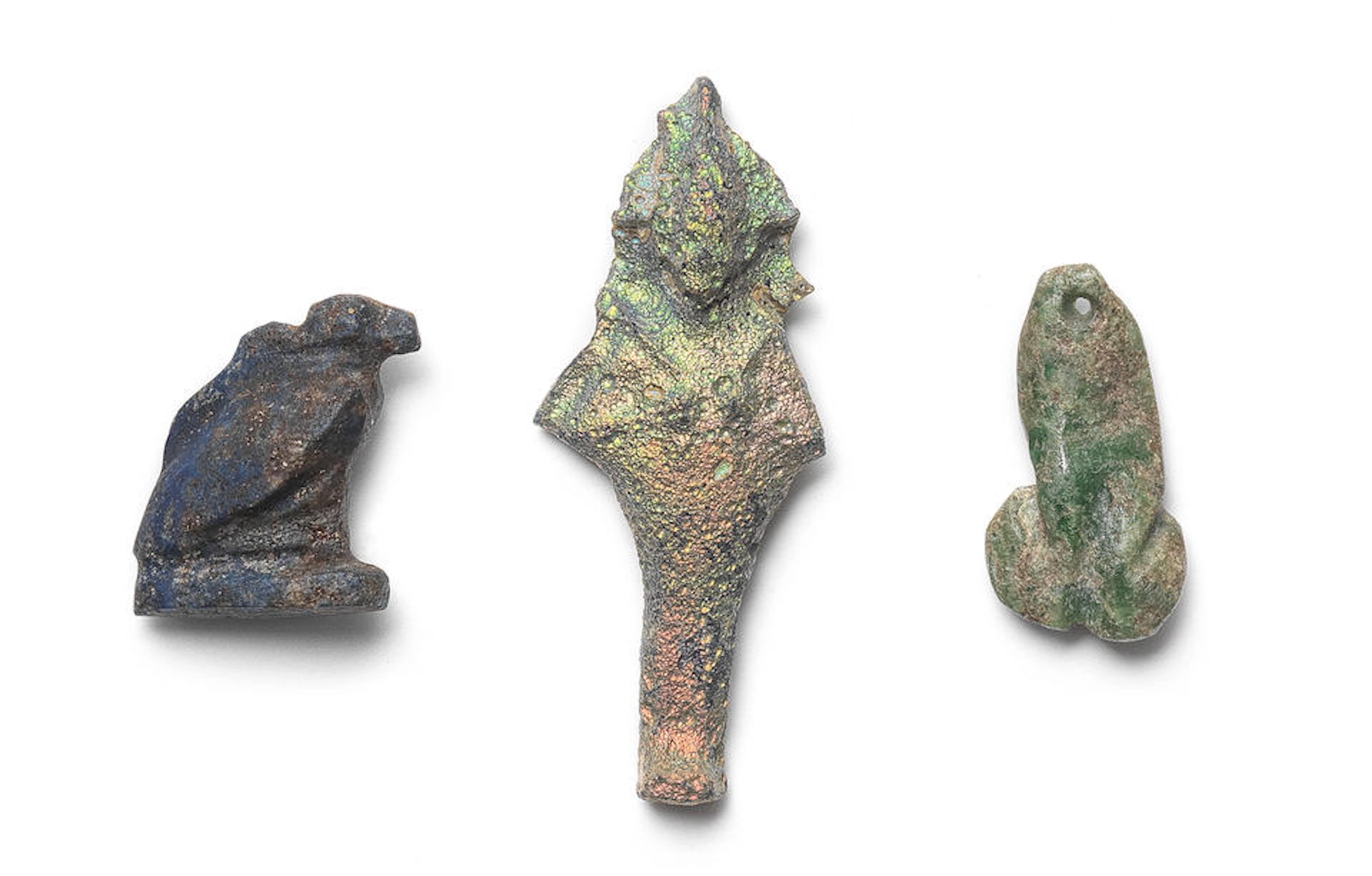 An Egyptian lapis lazuli vulture amulet and an Egyptian...