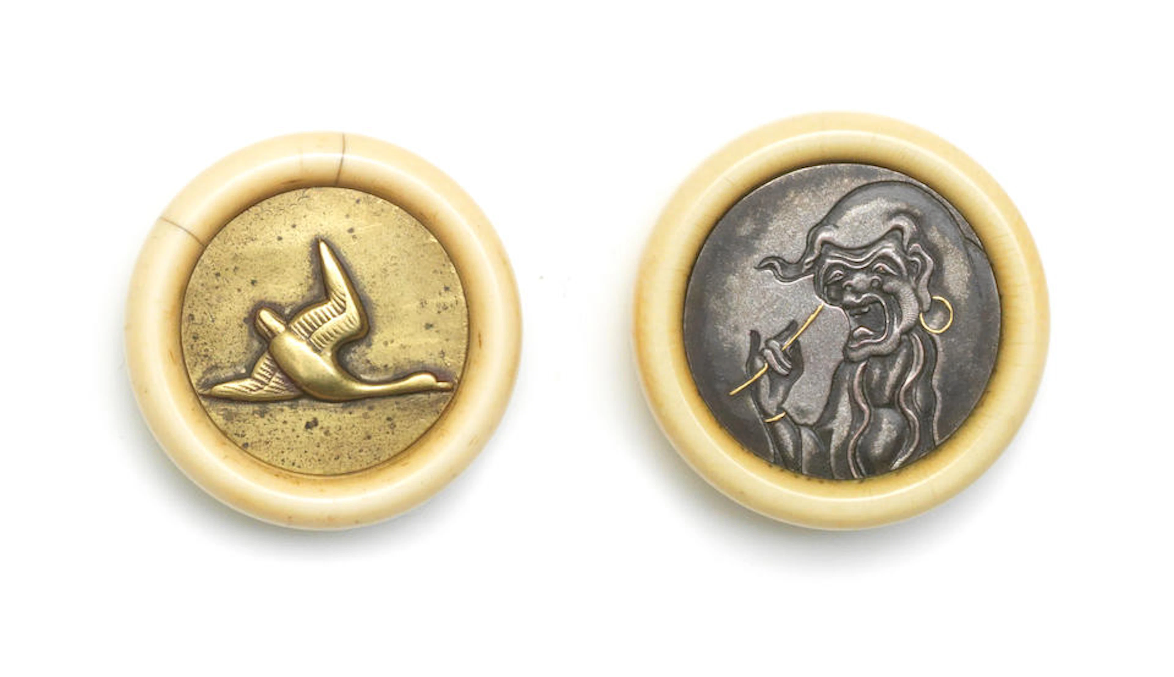 Two ivory kagamibuta netsuke Meiji era (1868-1912)