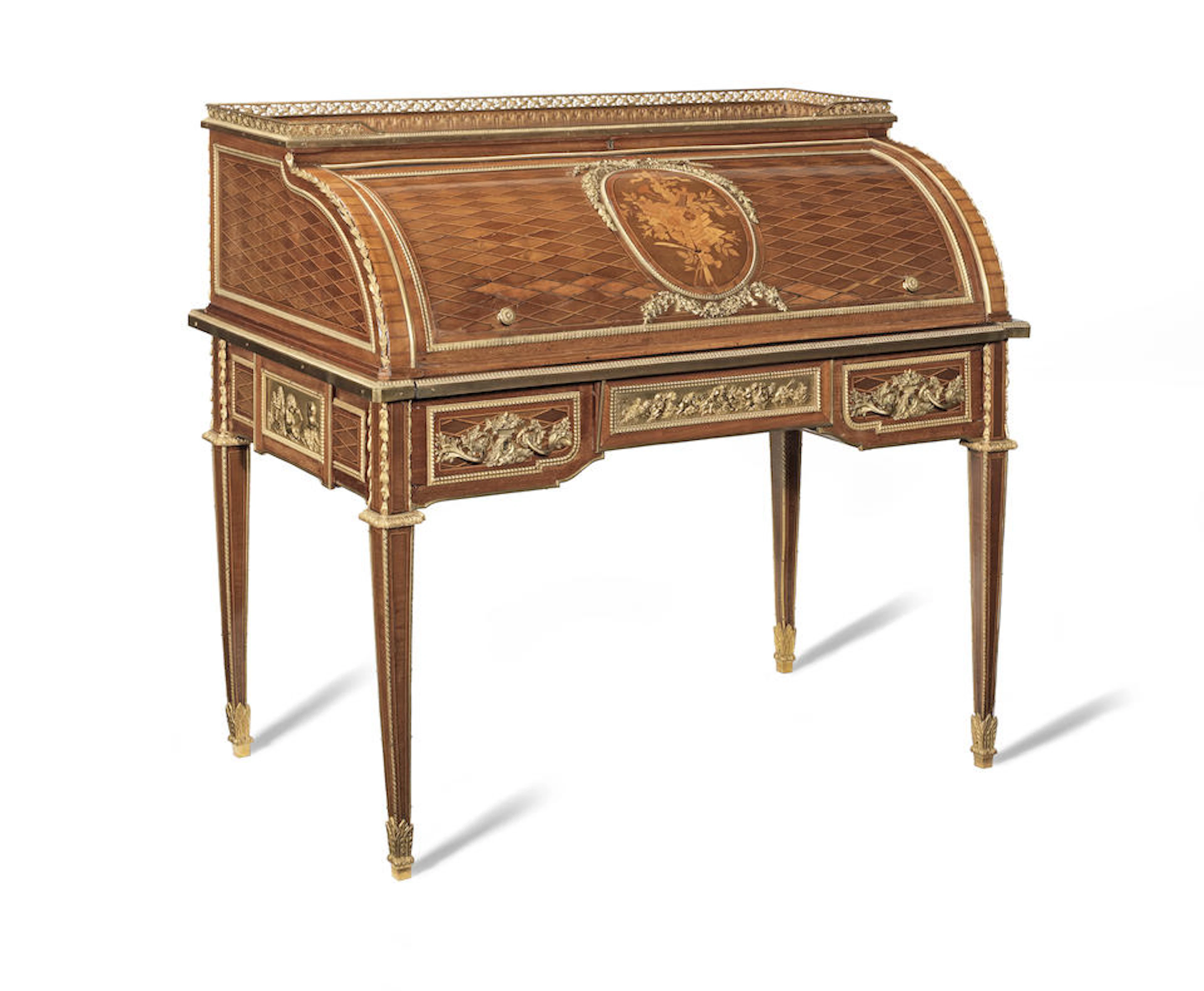 A Louis XVI style ormolu-mounted amaranth