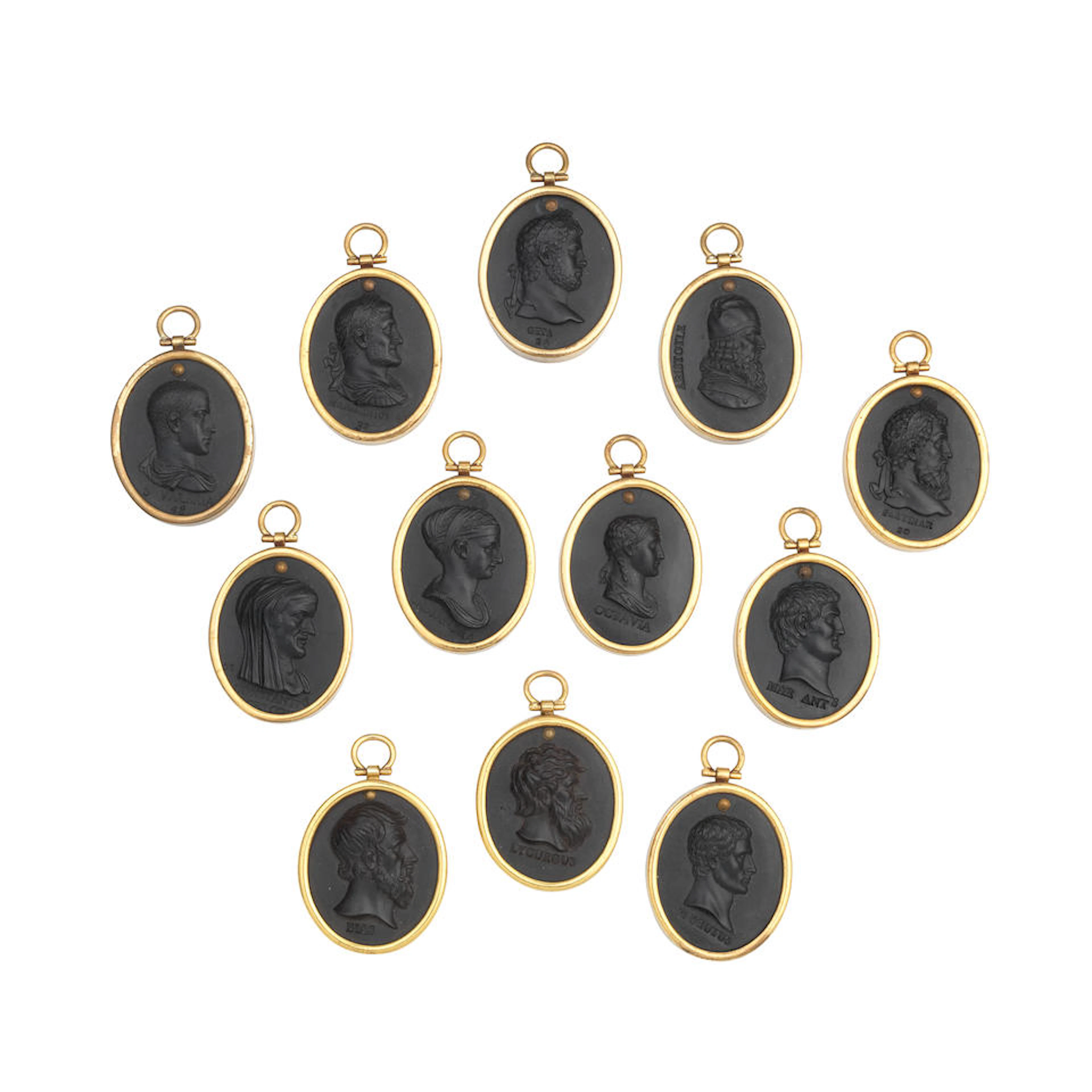 A set of twelve black basalt profile portrait medallions in the Wedgwood style