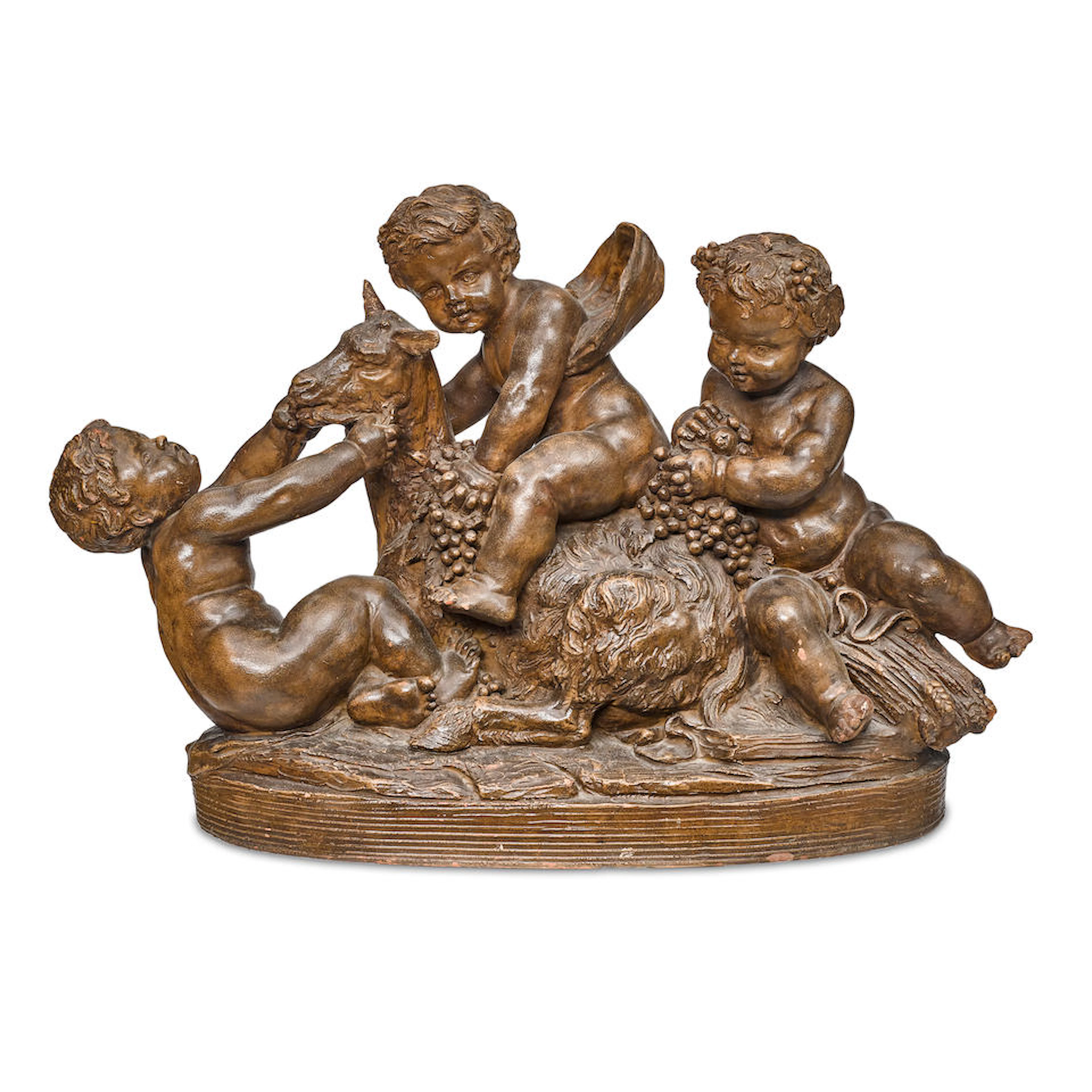 A TERRACOTTA FIGURAL GROUP OF PUTTI AND A GOATAfter Alfred Boucher (French