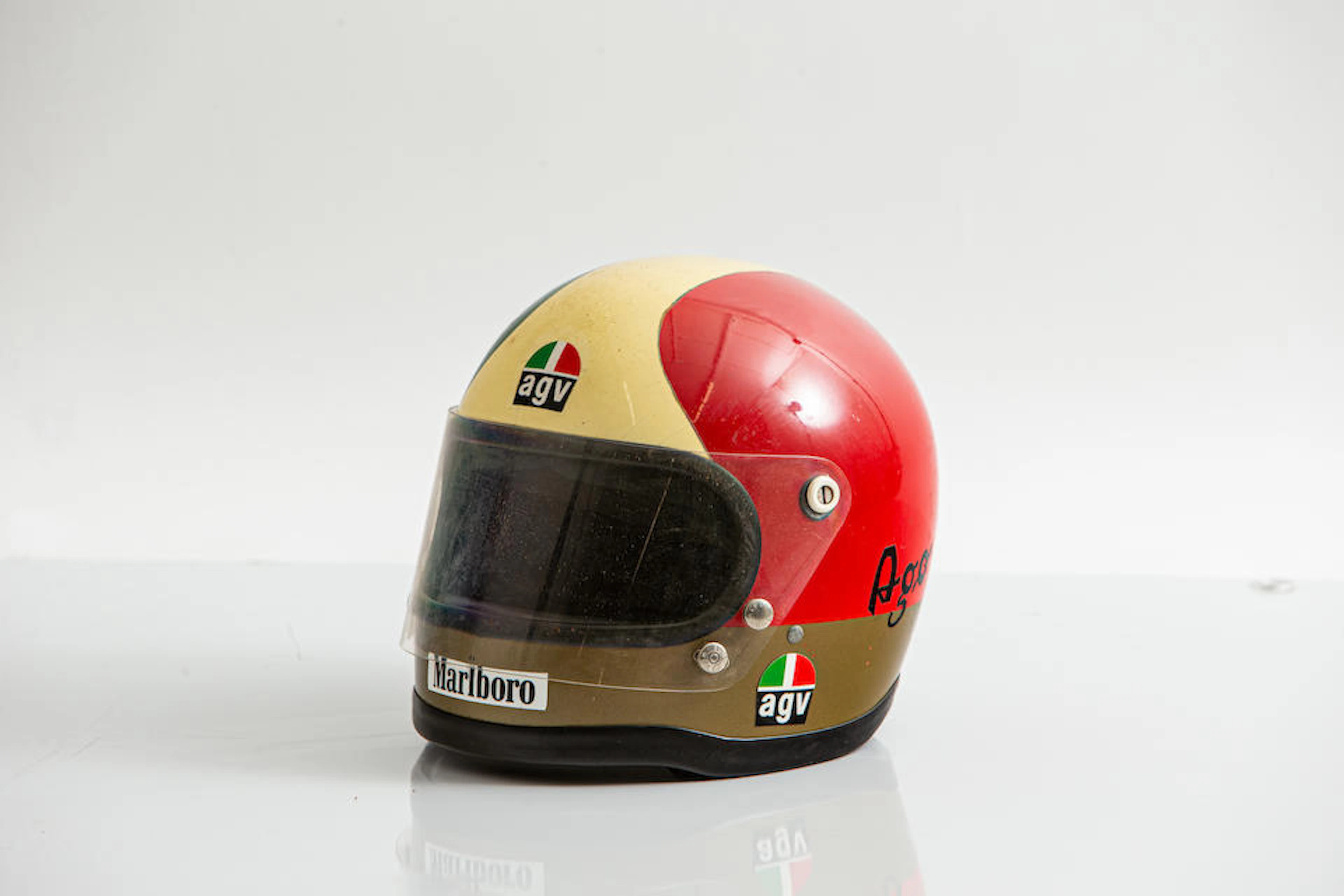An AGV helmet, by repute worn by Giacomo Agostini, believed 1970's