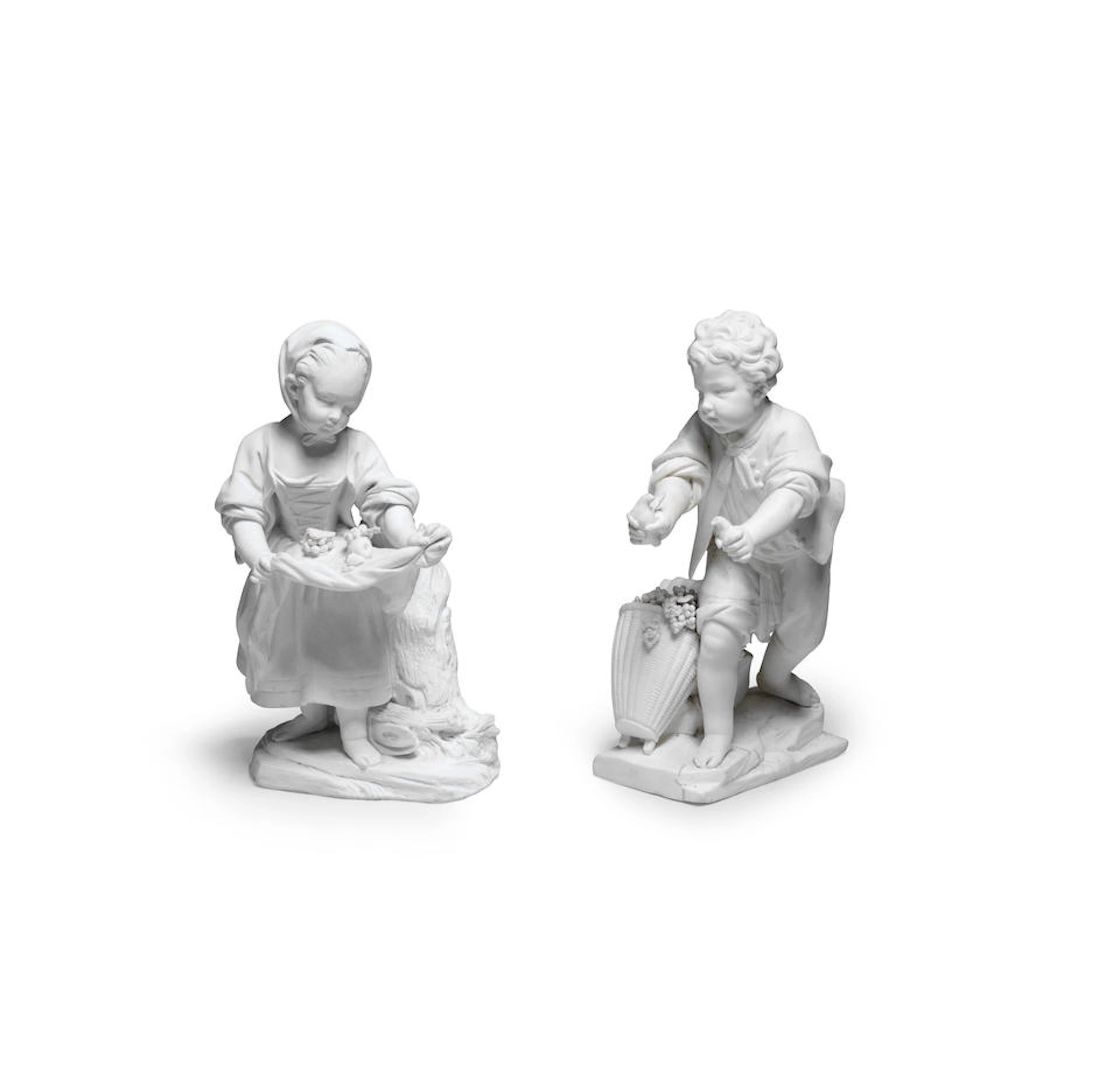 A pair of Sèvres biscuit figures of 'La Petite Fille au...