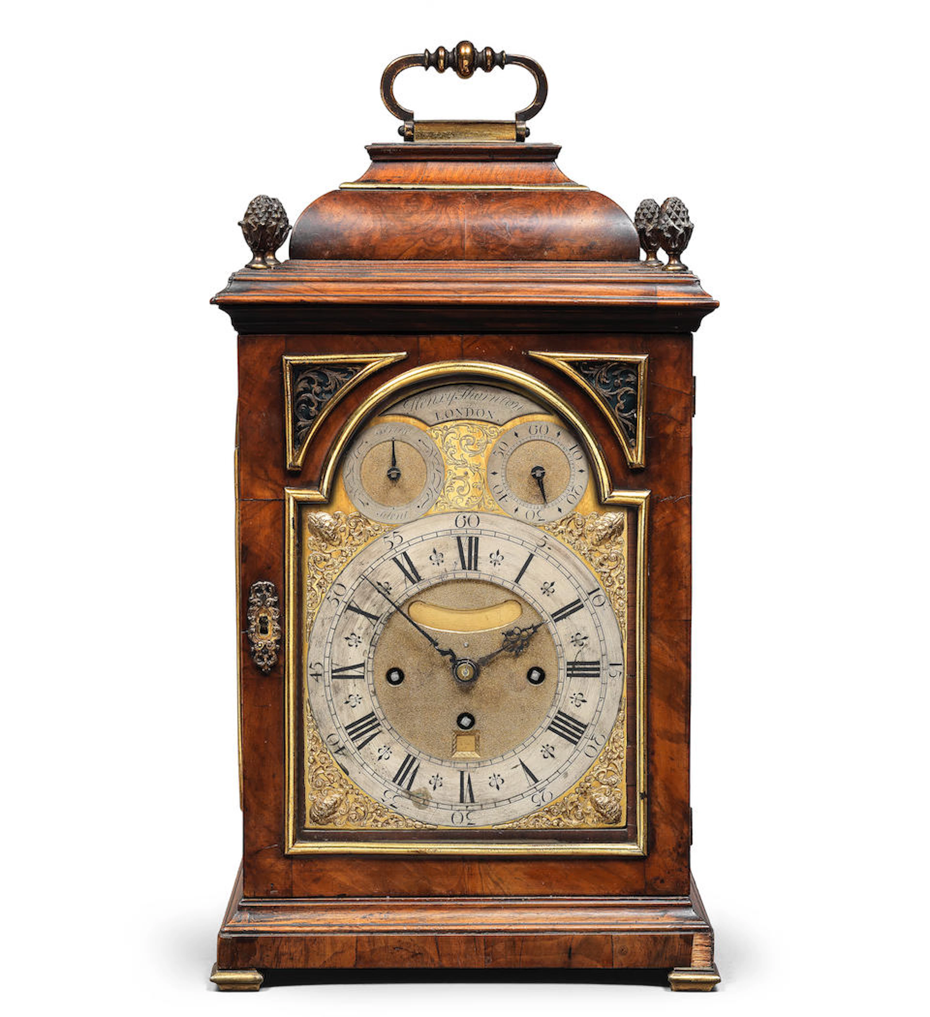 A brass-mounted walnut table clock of excellent colour